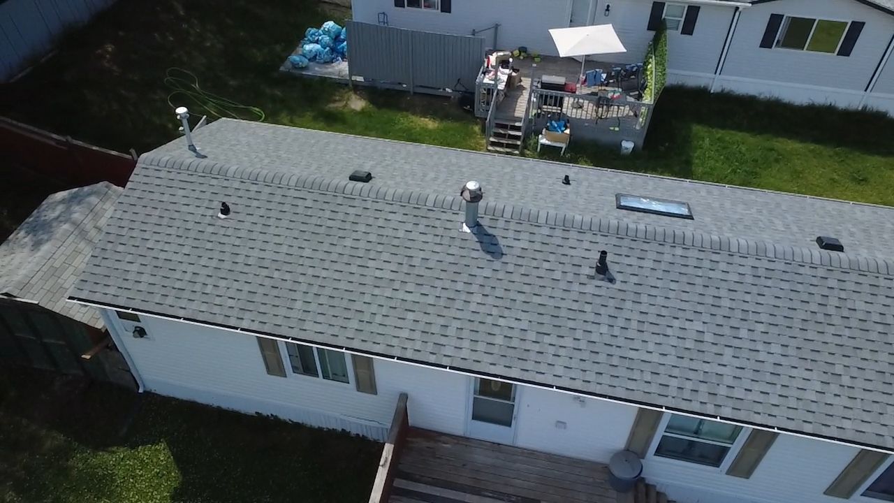 Silver Gray on Mystique  by 2thetop Roofing