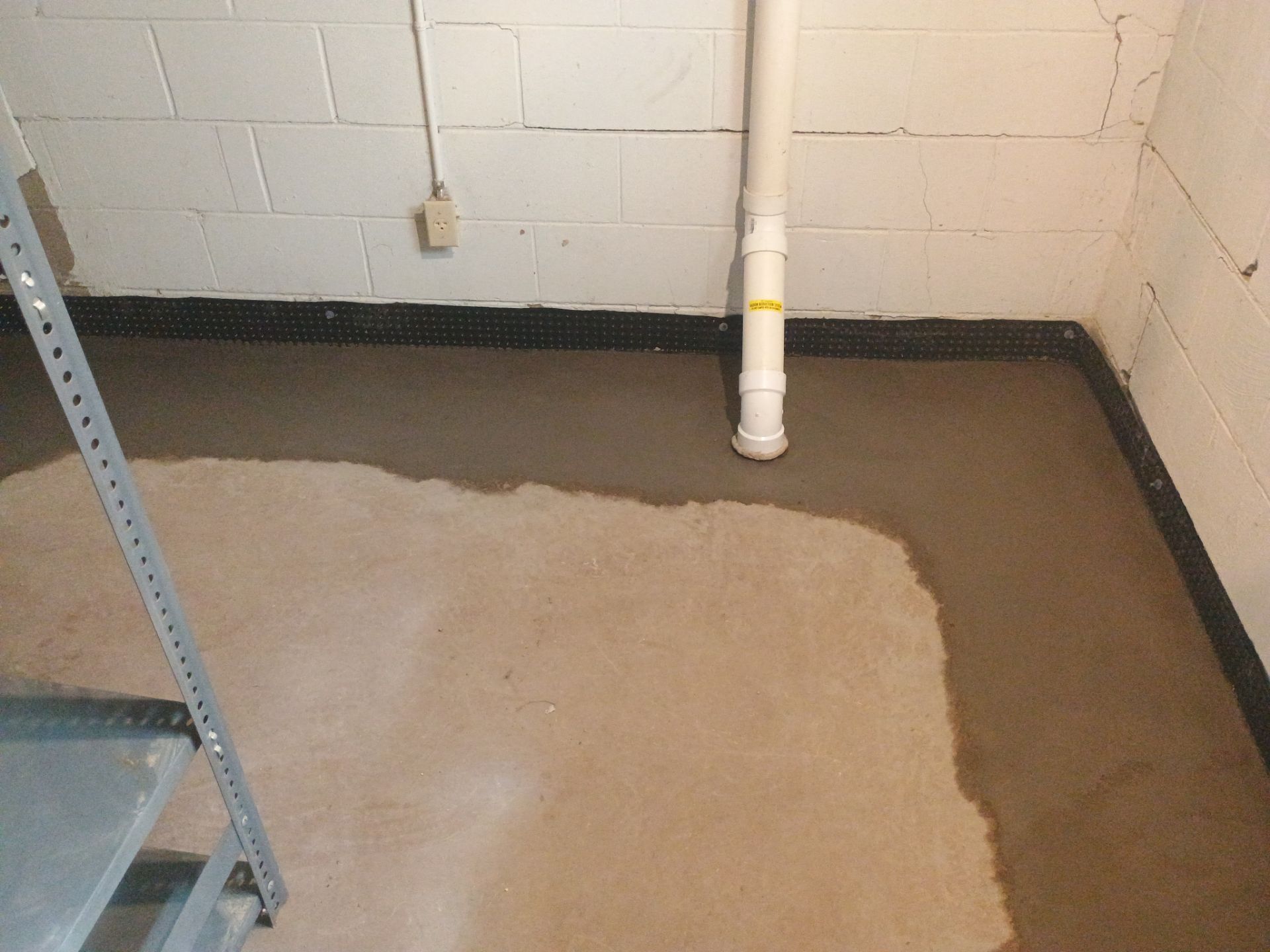 Interior Drain Tile Installation in South Minneapolis by Waterproofing Northeast