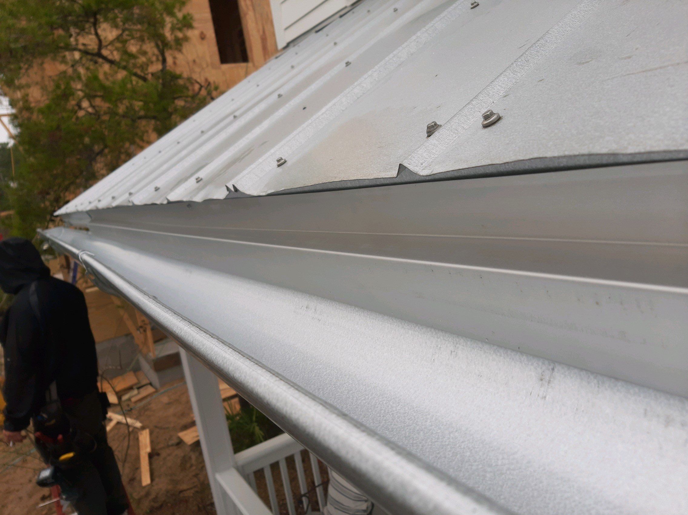 Gutter Installation using Galvalume Half Round Seamless Gutters by Gutter Professors