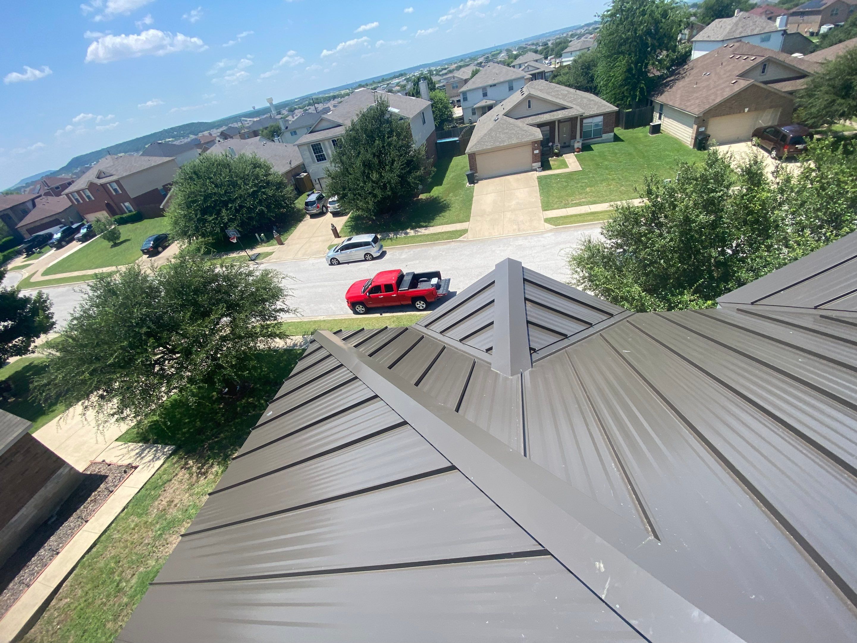 Standing seam metal hip roof
