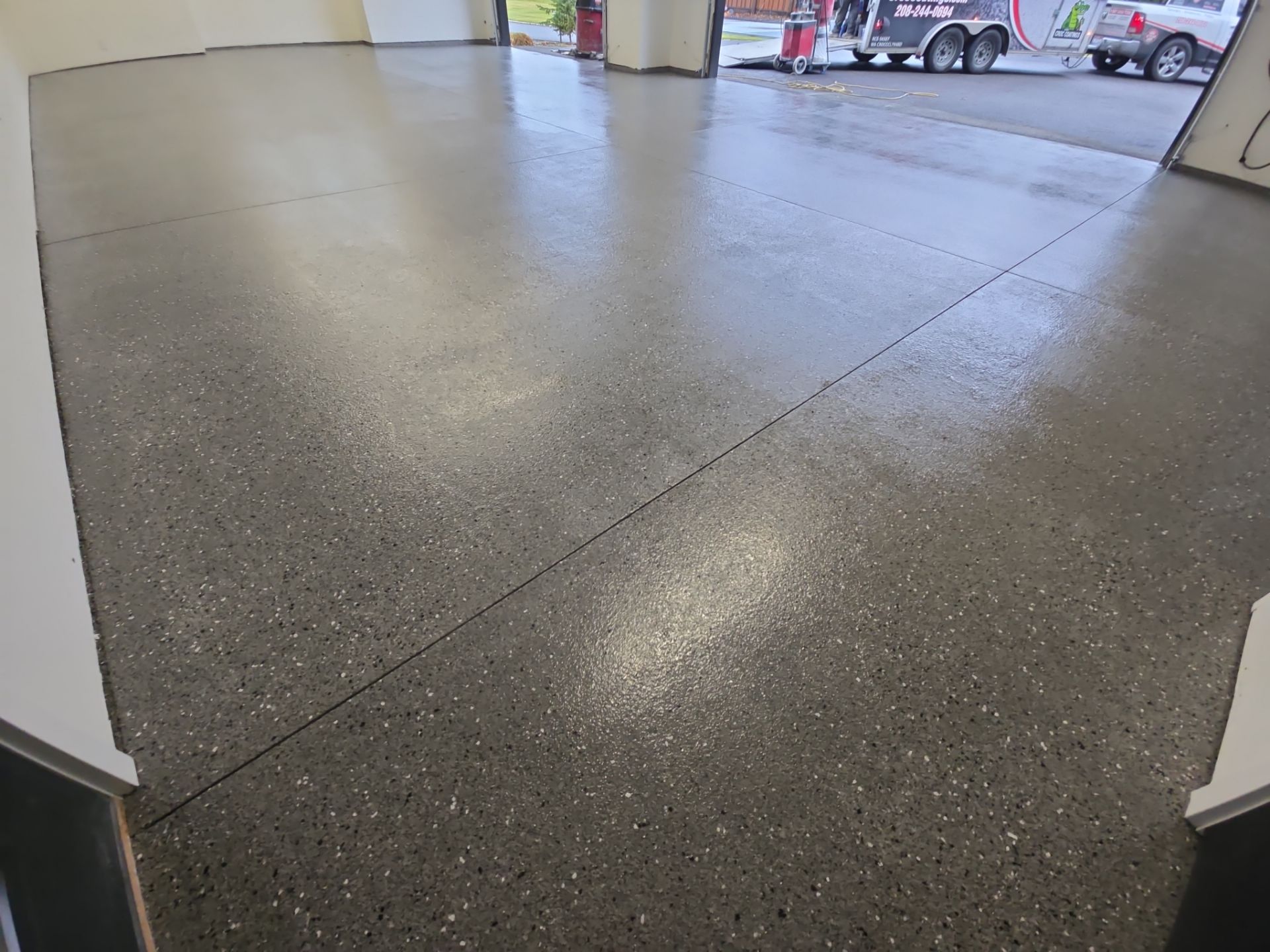 Garage Transformation using Slate Hybrid by Croc Coatings, LLC