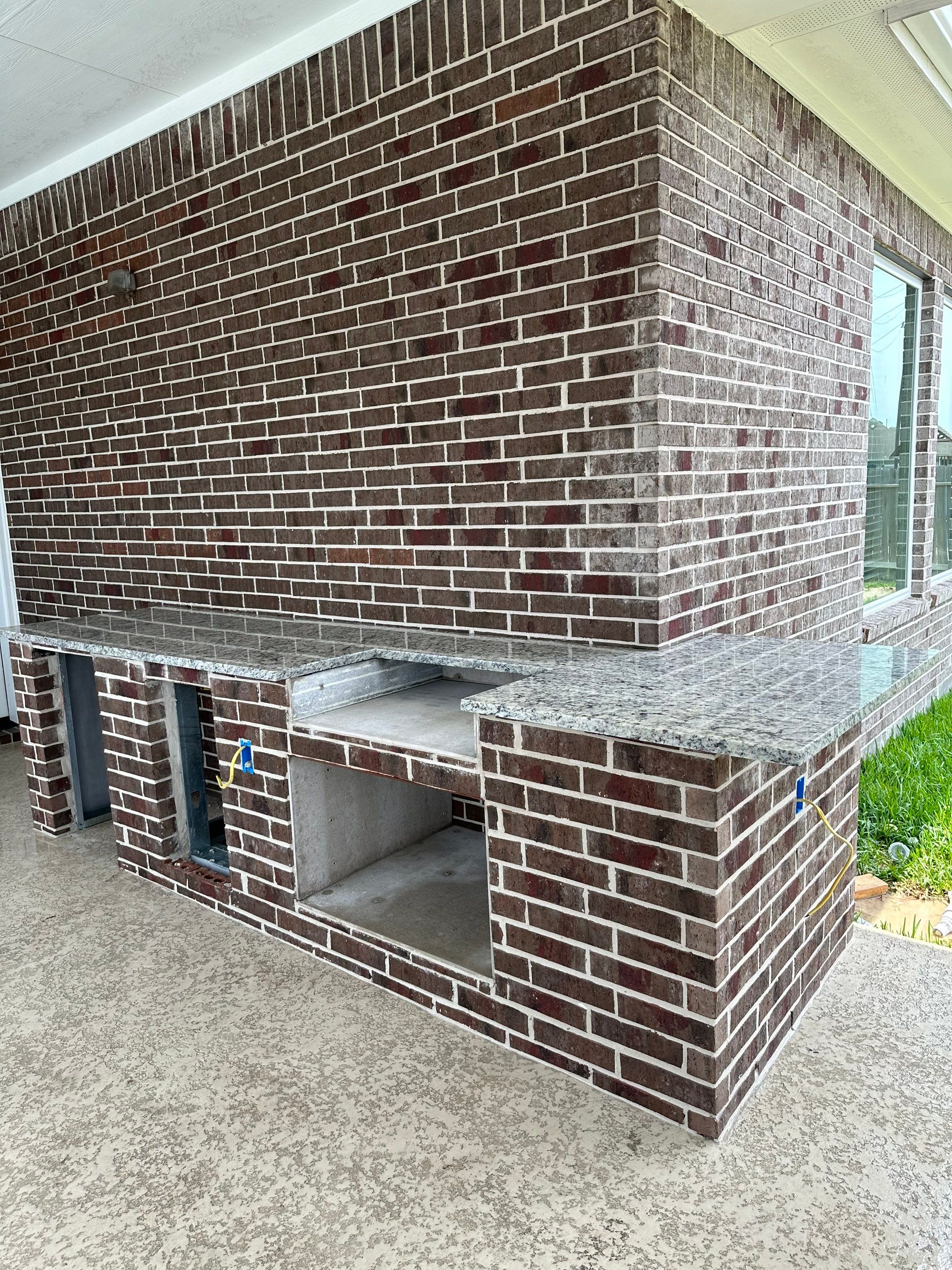 Covered patio and Summer Kitchen in Spring, TX by SophAlx LLC