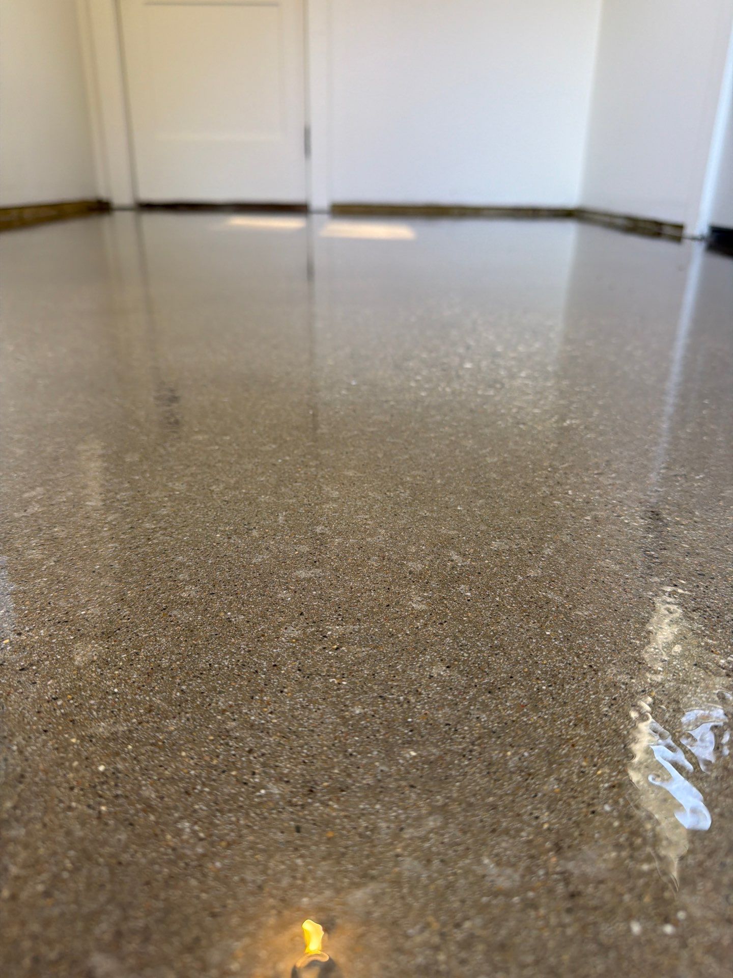 Speckled Epoxy Floor Installation and Concrete Refinishing in Nunica by Gordon Painting