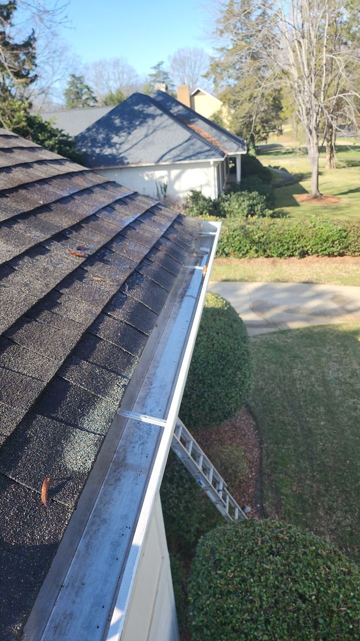 Gutter Cleaning using water by Power Wash Masters LLC
