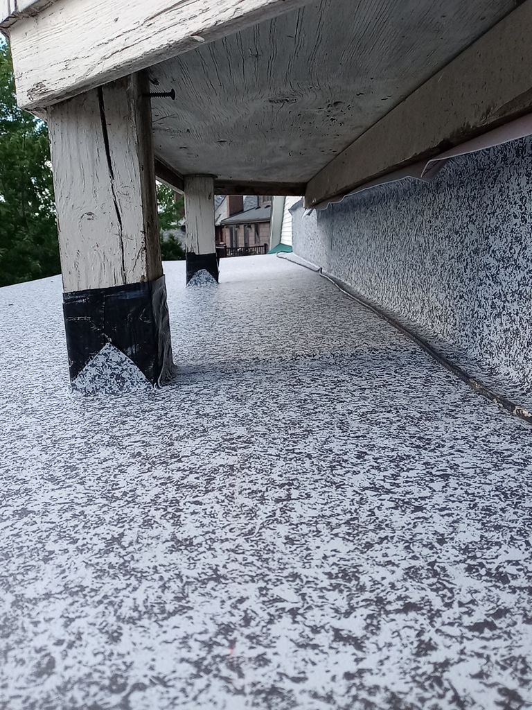 Residential Roofing Installation, Dec-tek walk-out porch roof, siding on garage by Absolute Roofing and Construction
