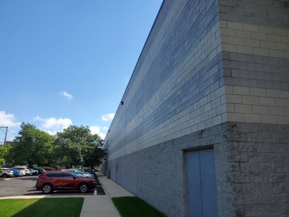 commercial pressure washing using Algaecide, soft wash soap by Northern Power Washing LLC.