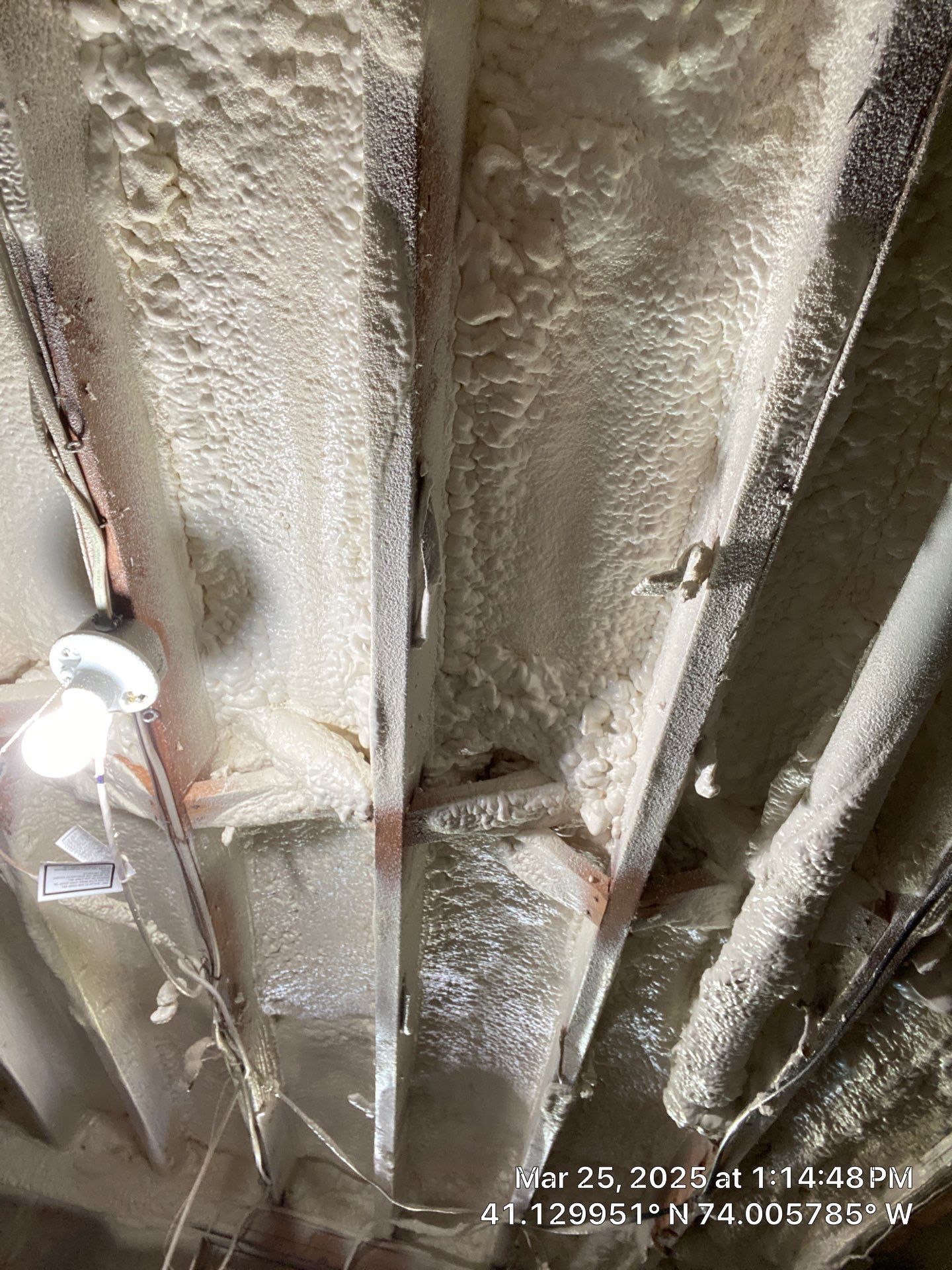 Attic Insulation using open cell spray foam and closed cell rim joist by NYS Foam & Energy