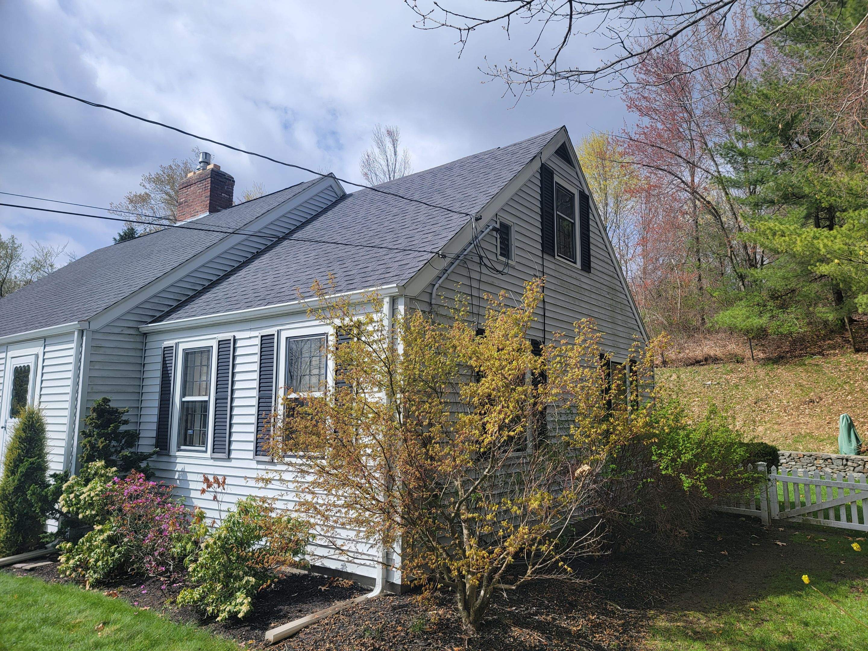Siding Installation using James Hardie Countrylane red by UBrothers Construction