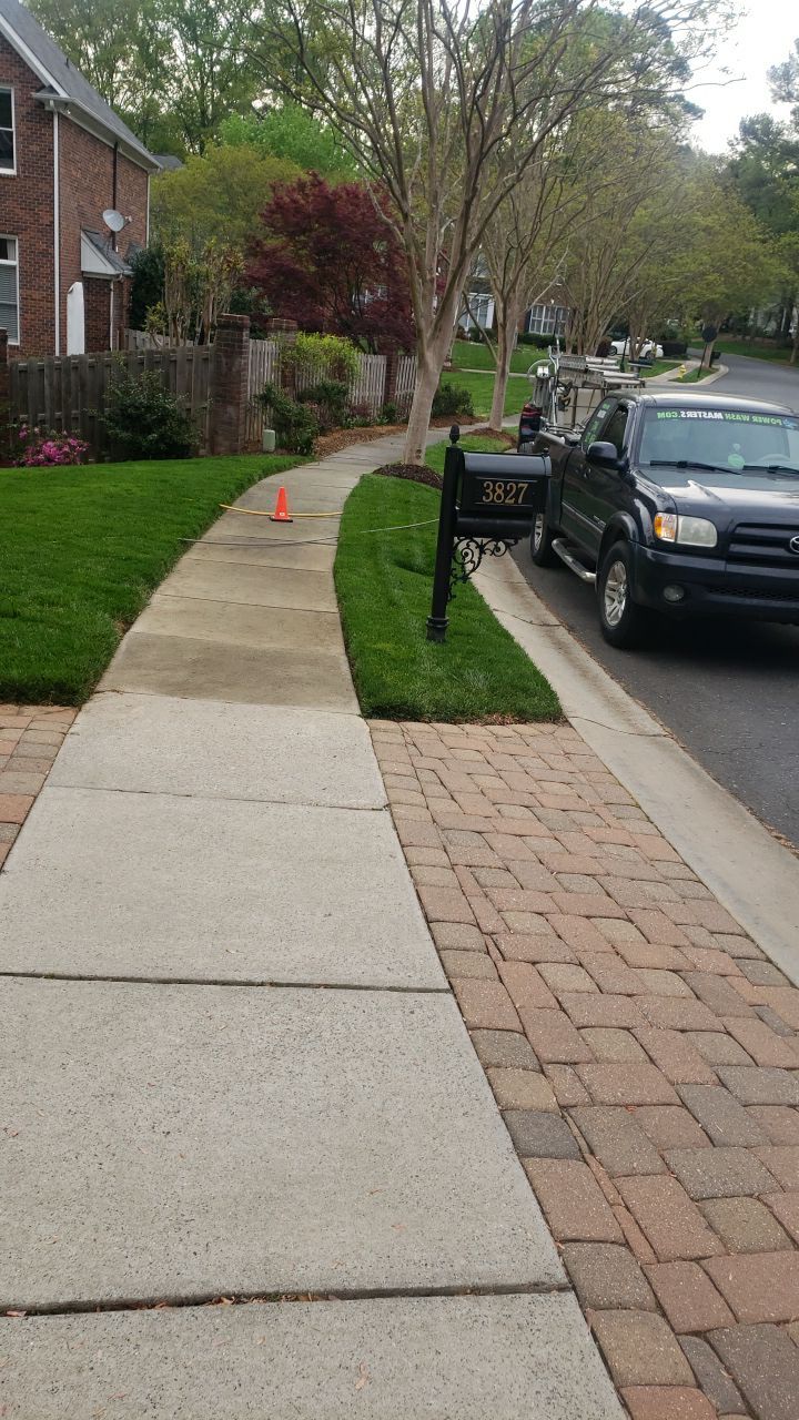 patio cleaning using cleaner by Power Wash Masters LLC