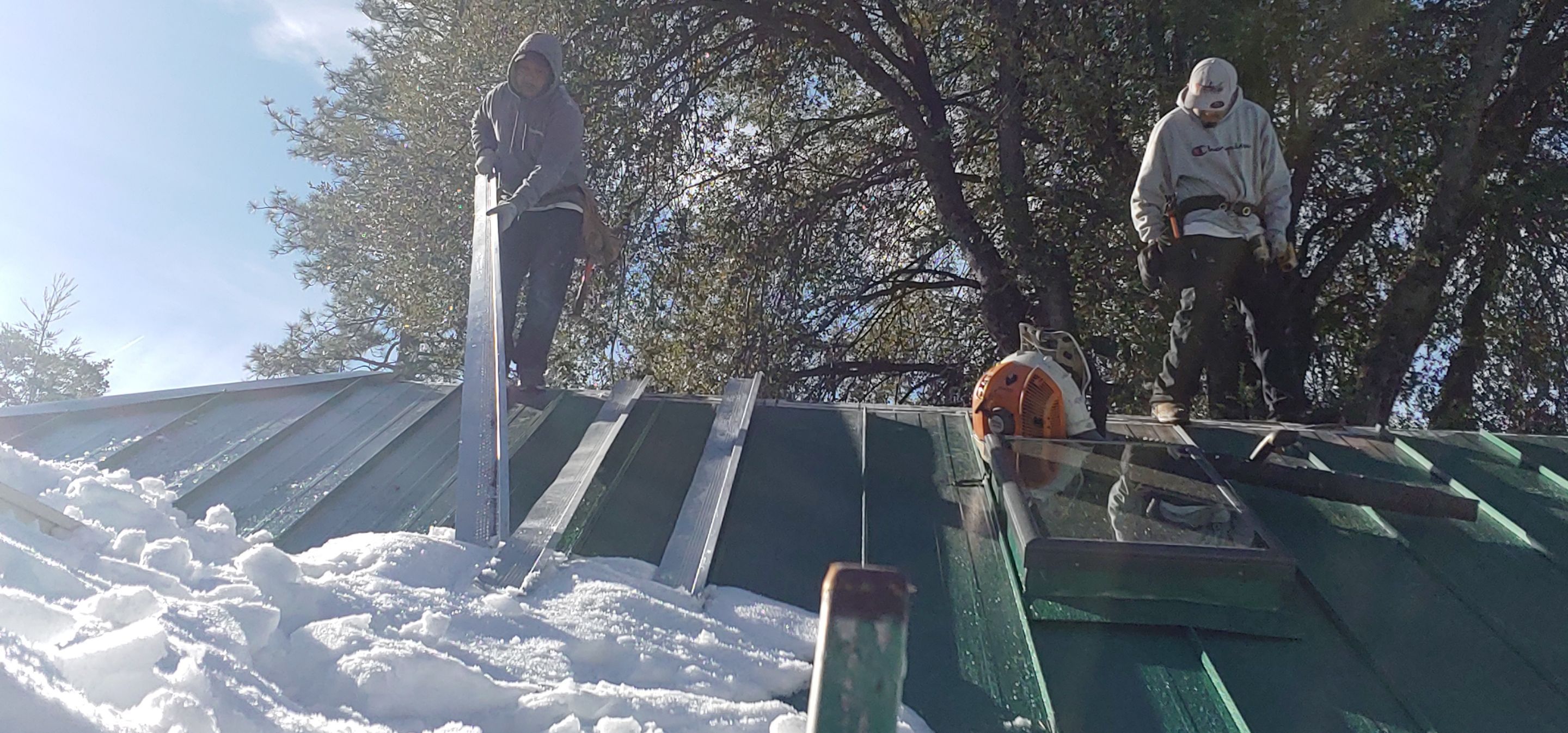 Metal roofing installation using Standing seam metal roofing system by Straight Edge Roofing Inc