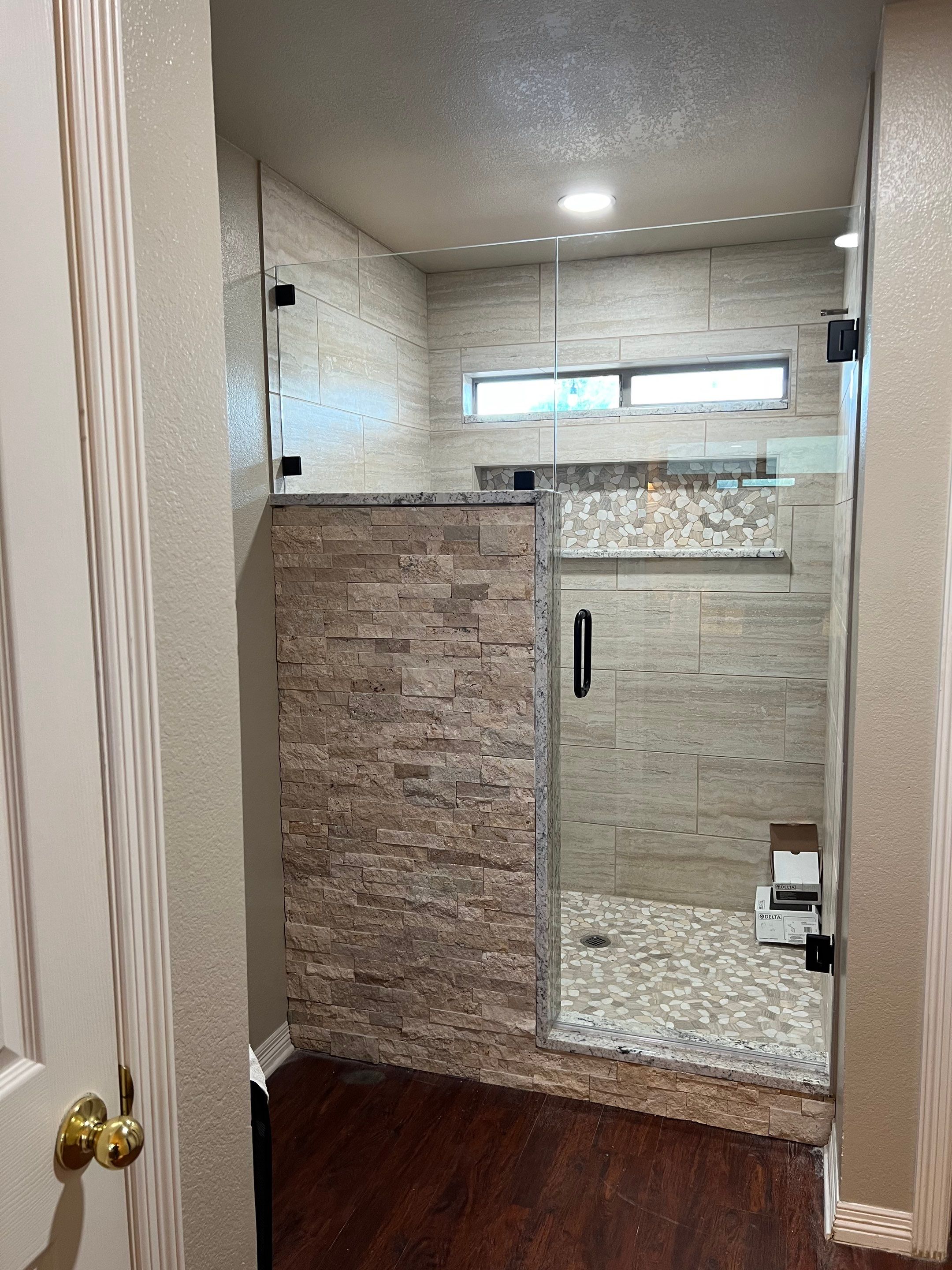 Bathroom Shower Remodel for a client by First United Roofing & Construction