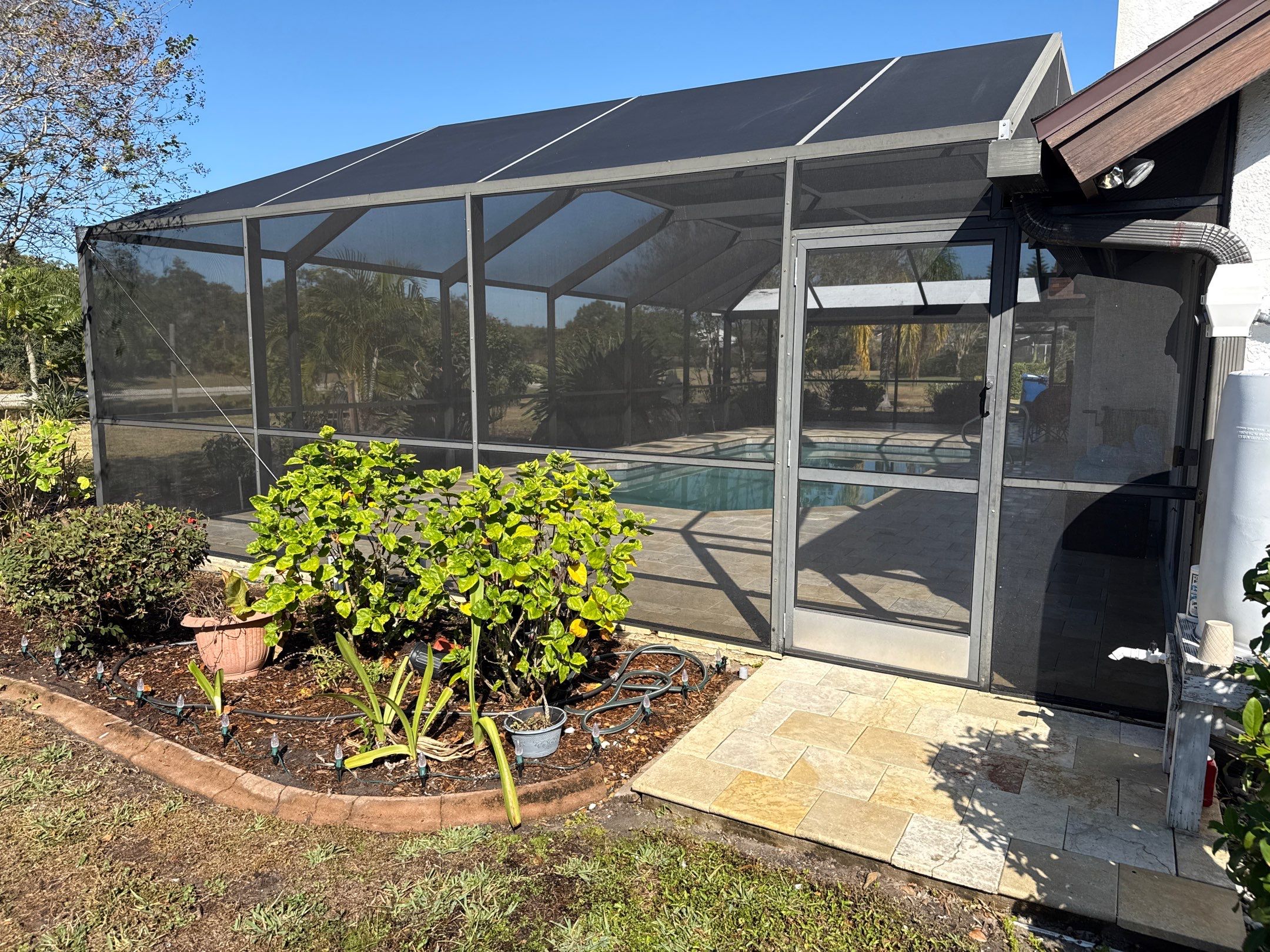 Paver Pool Deck & Screen Enclosure Cleaning | River Wilderness, Parrish FL by Sunshine AquaWash