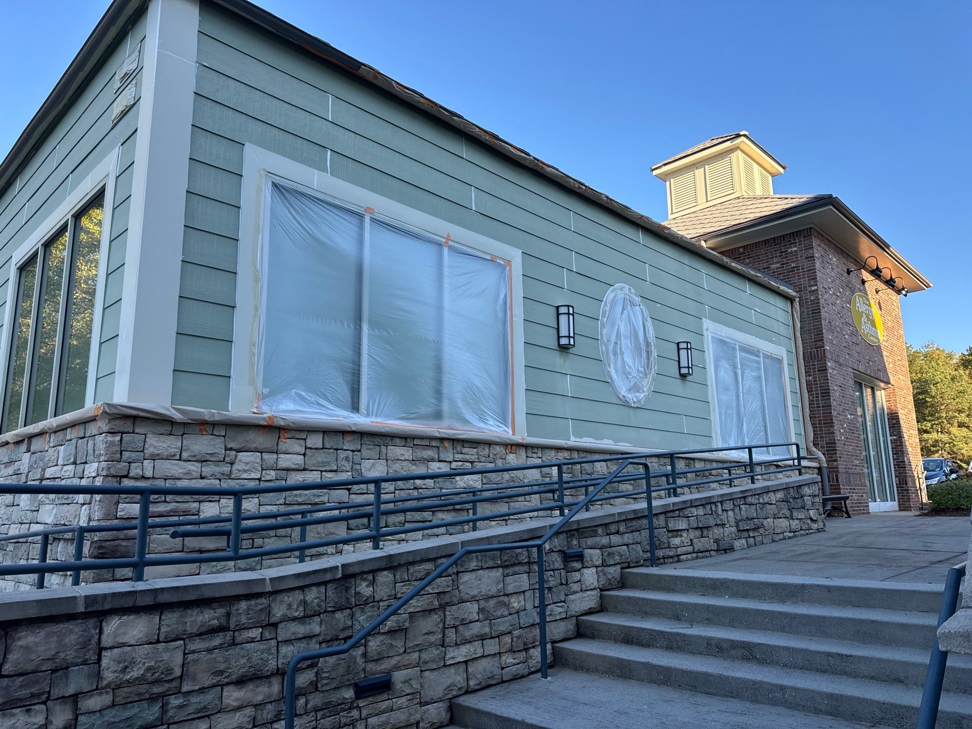 Commercial Exterior & Stairwell Painting – Corner Market by Praise God Painting, LLC