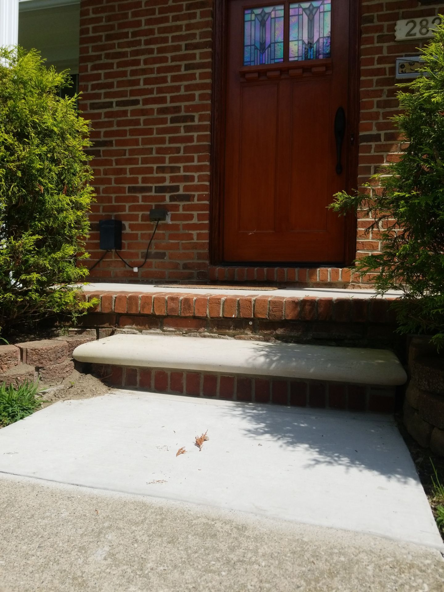 Replace old columns new carpentry repair door masonry limestone steps in Dearborn, MI by Northwest Construction 