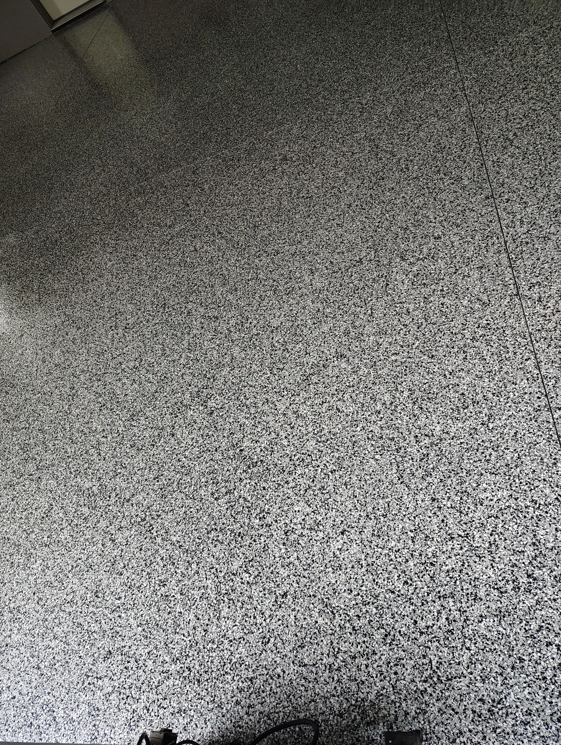 Garage Floor Concrete Coating and Crack Repair in Sioux Falls by Select Painting, Coatings & Garage Cabinets
