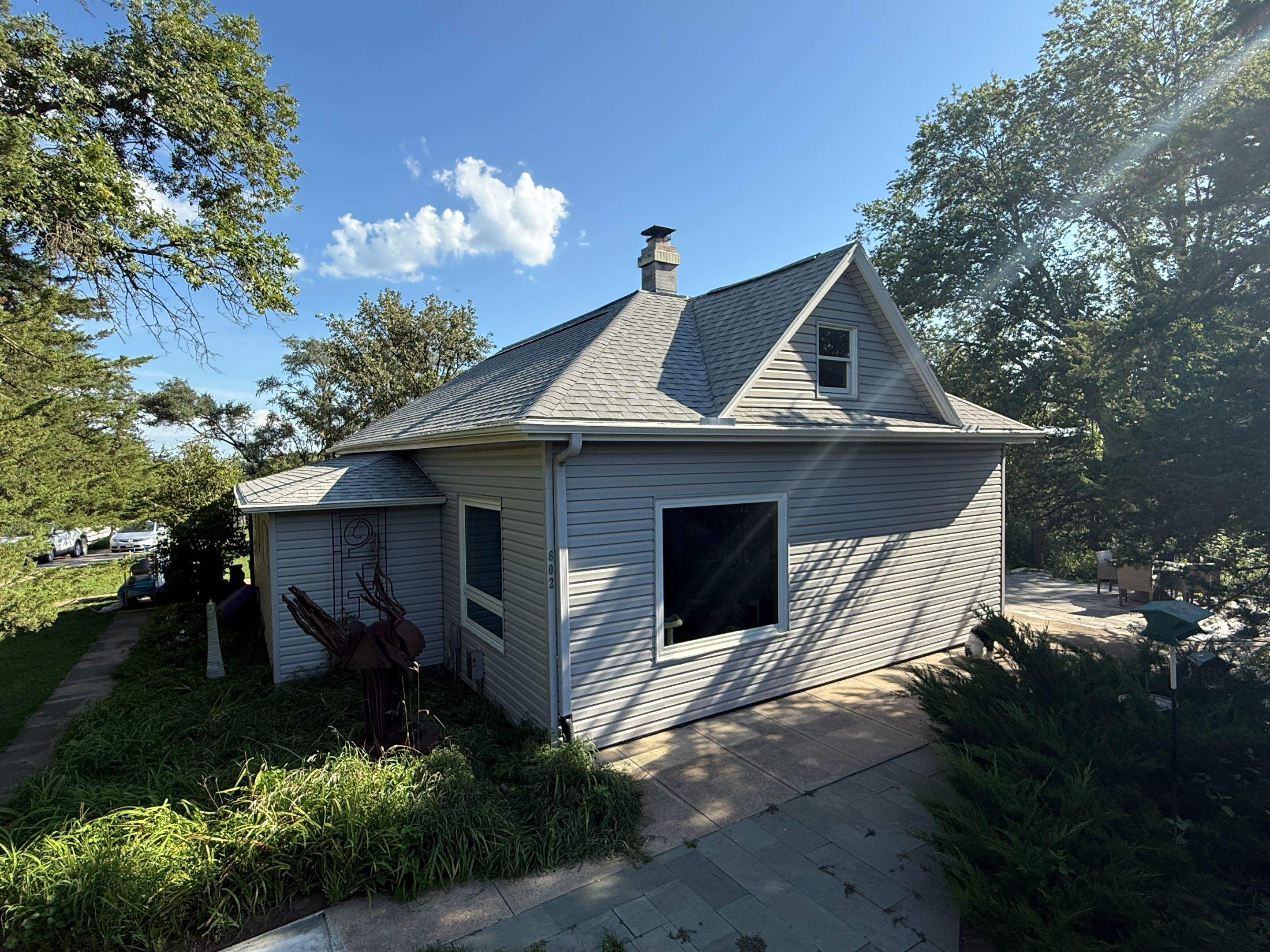 Asphalt Shingle and EPDM Membrane Roof Installation in Mineola by Star Home