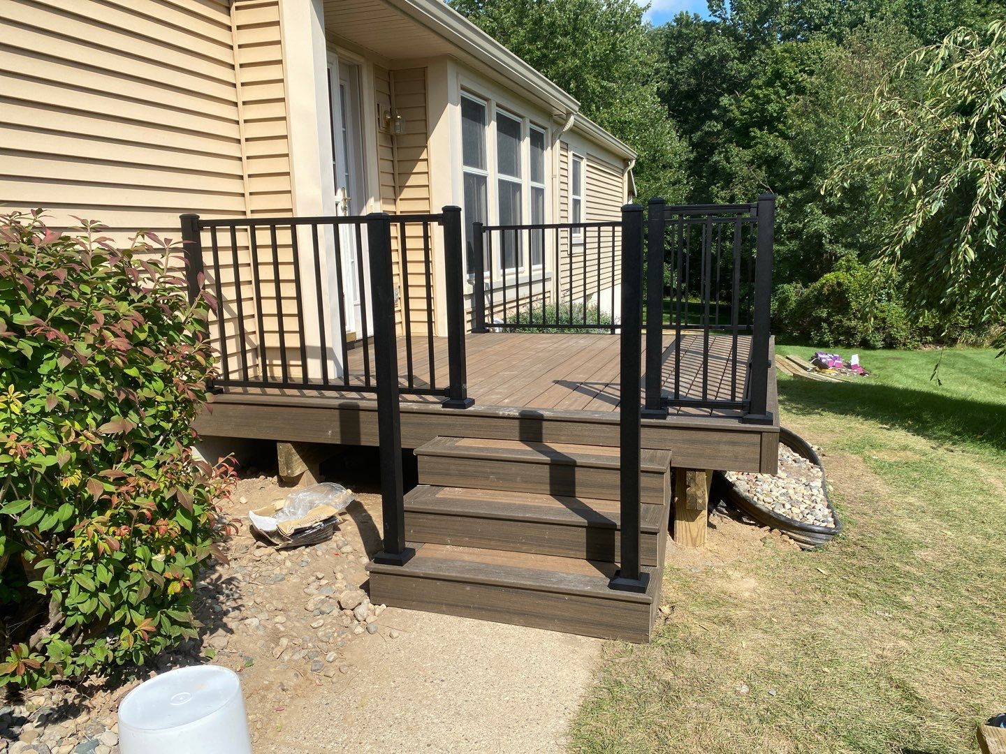 Trex Decks on a Condo by Acme Exteriors