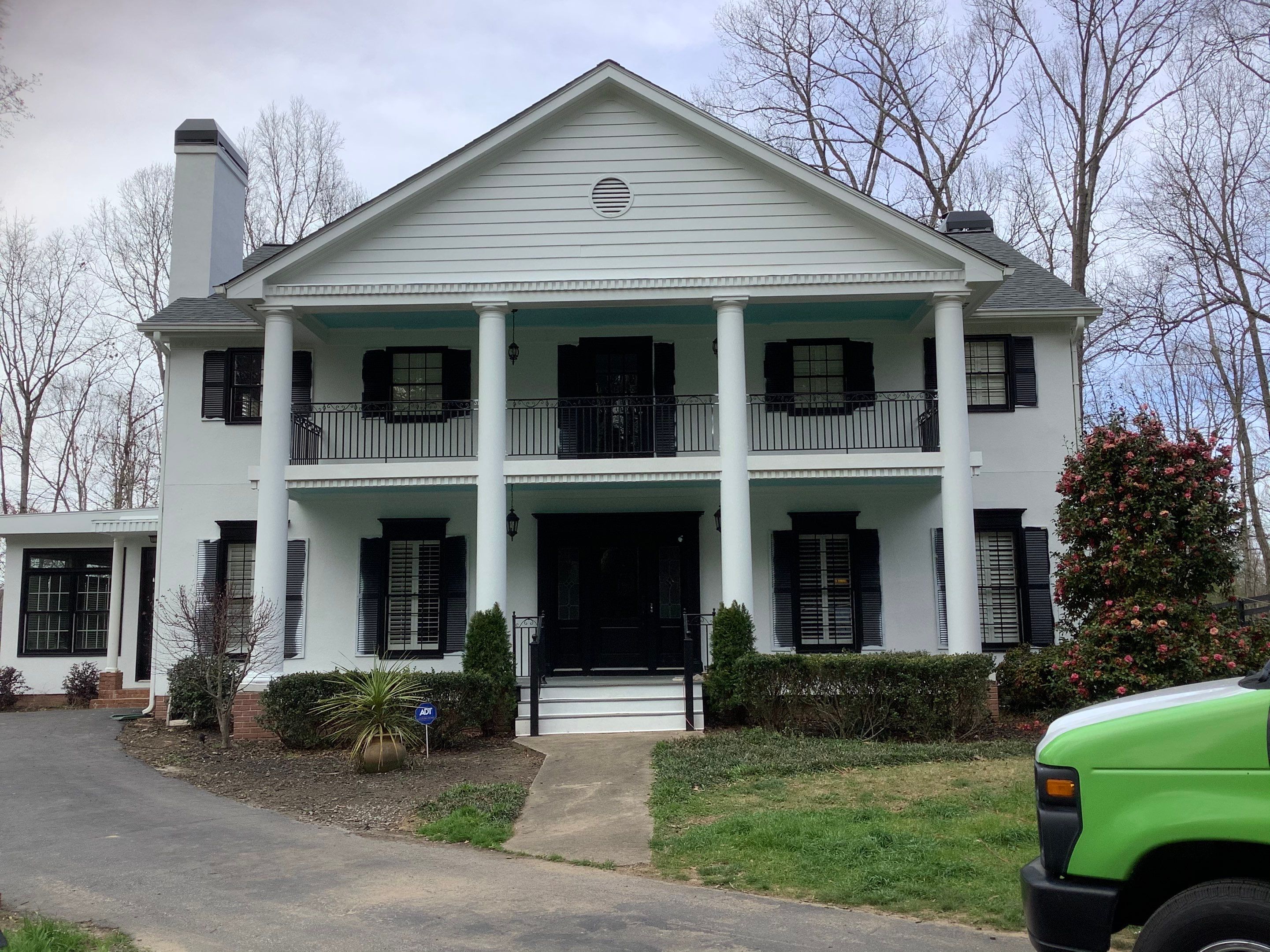Full Exterior Repaint for Colonial Style Home in Cumming by Swift Home Renovations