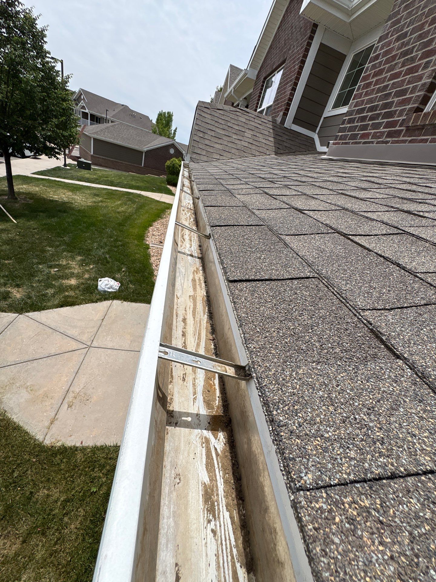 HOA gutter cleaning after photo.