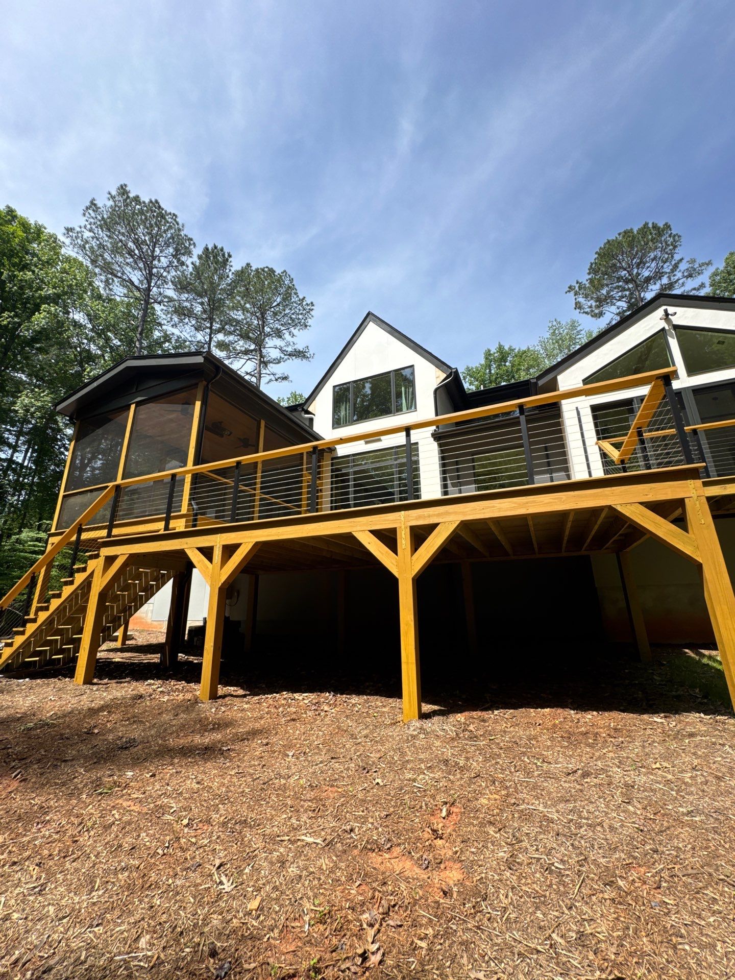 Porch and Deck staining  by GonzalezPainters & Contractors Inc 