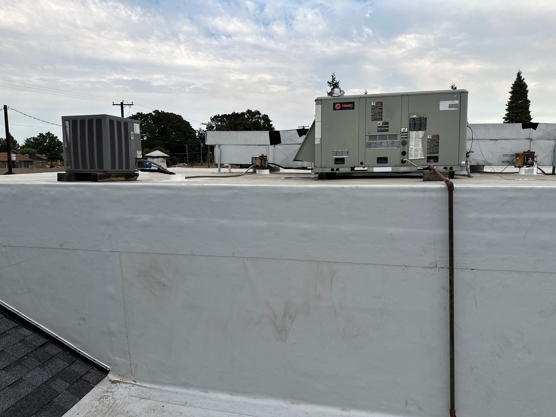 Summit Grey Lum Yun Salem Oregon Commercial Roof by Orezona Building & Roofing Company, Inc.