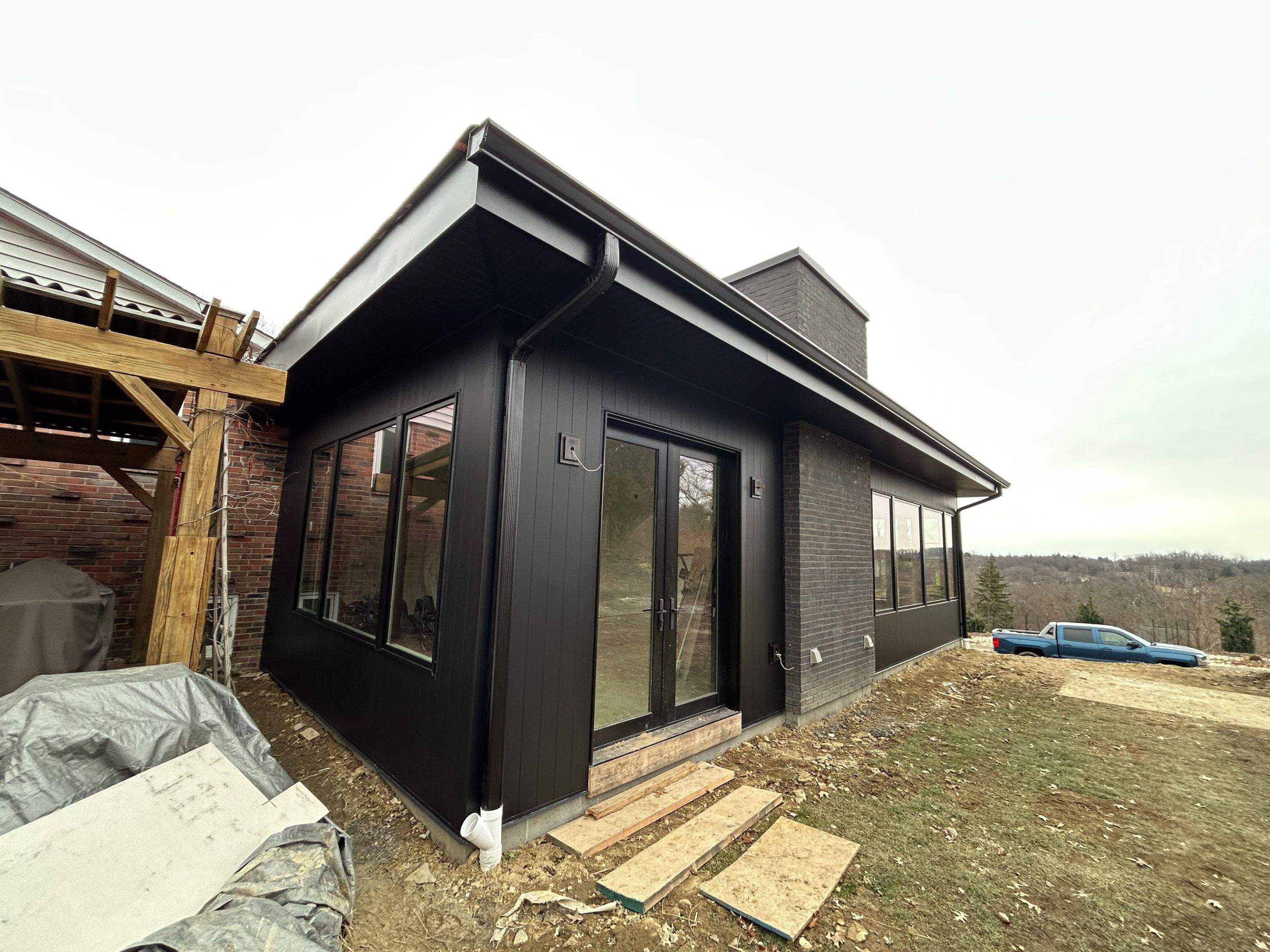 Modern Home Addition with Matte Black Siding in Pittsburgh by Ideal Siding Pittsburgh