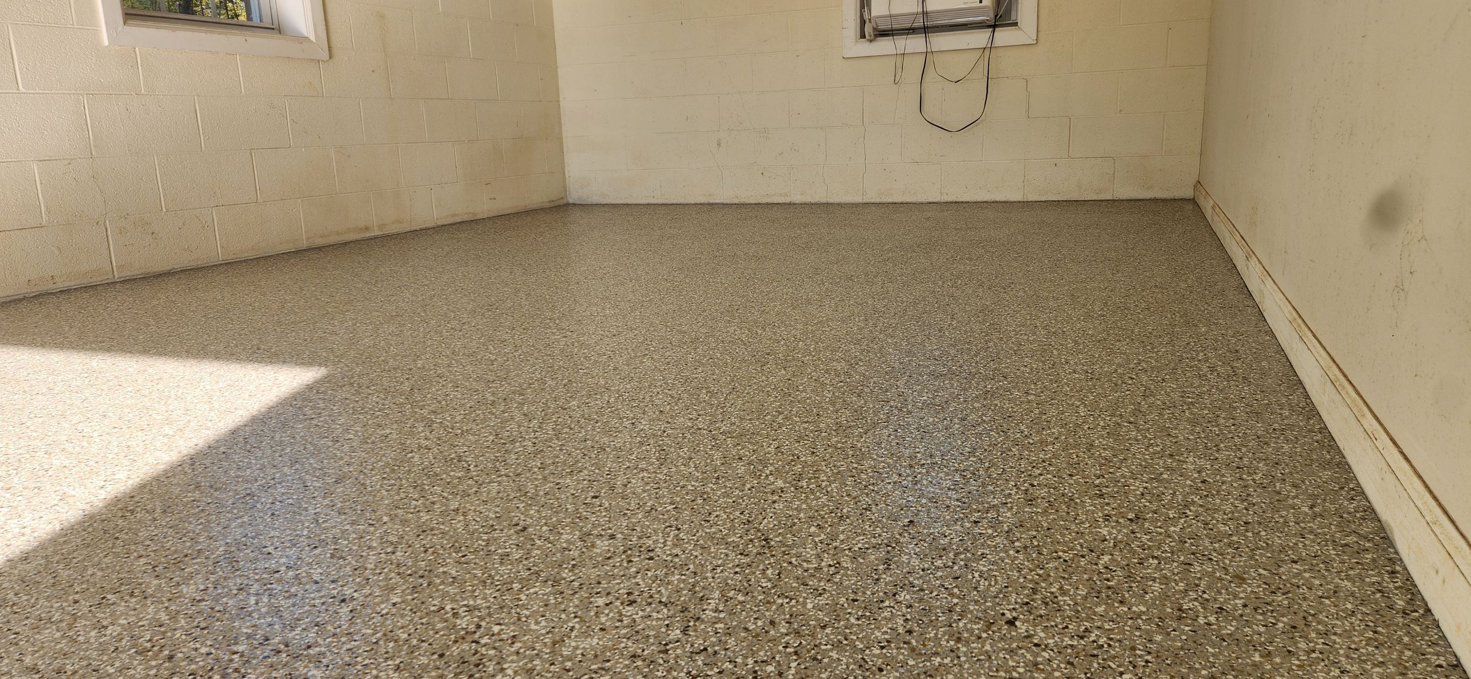 Porch & Garage Using Rocky Ridge & Creekbed by Elite Floor Solutions