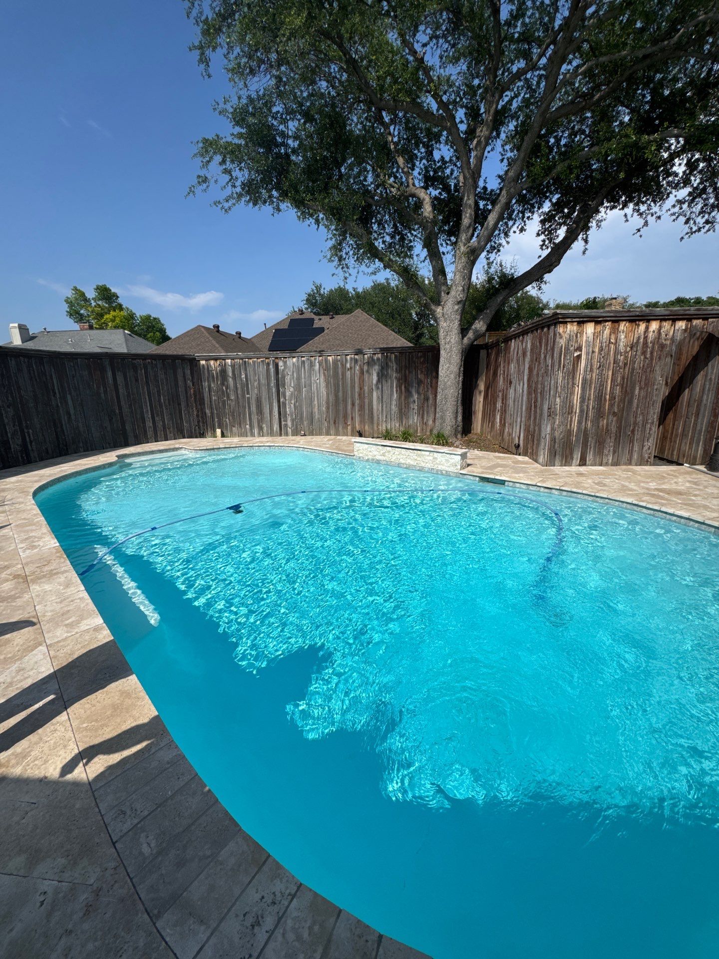 Freeform Pool Remodel with Travertine Deck by Pinnacle Pools and Spas - DFW