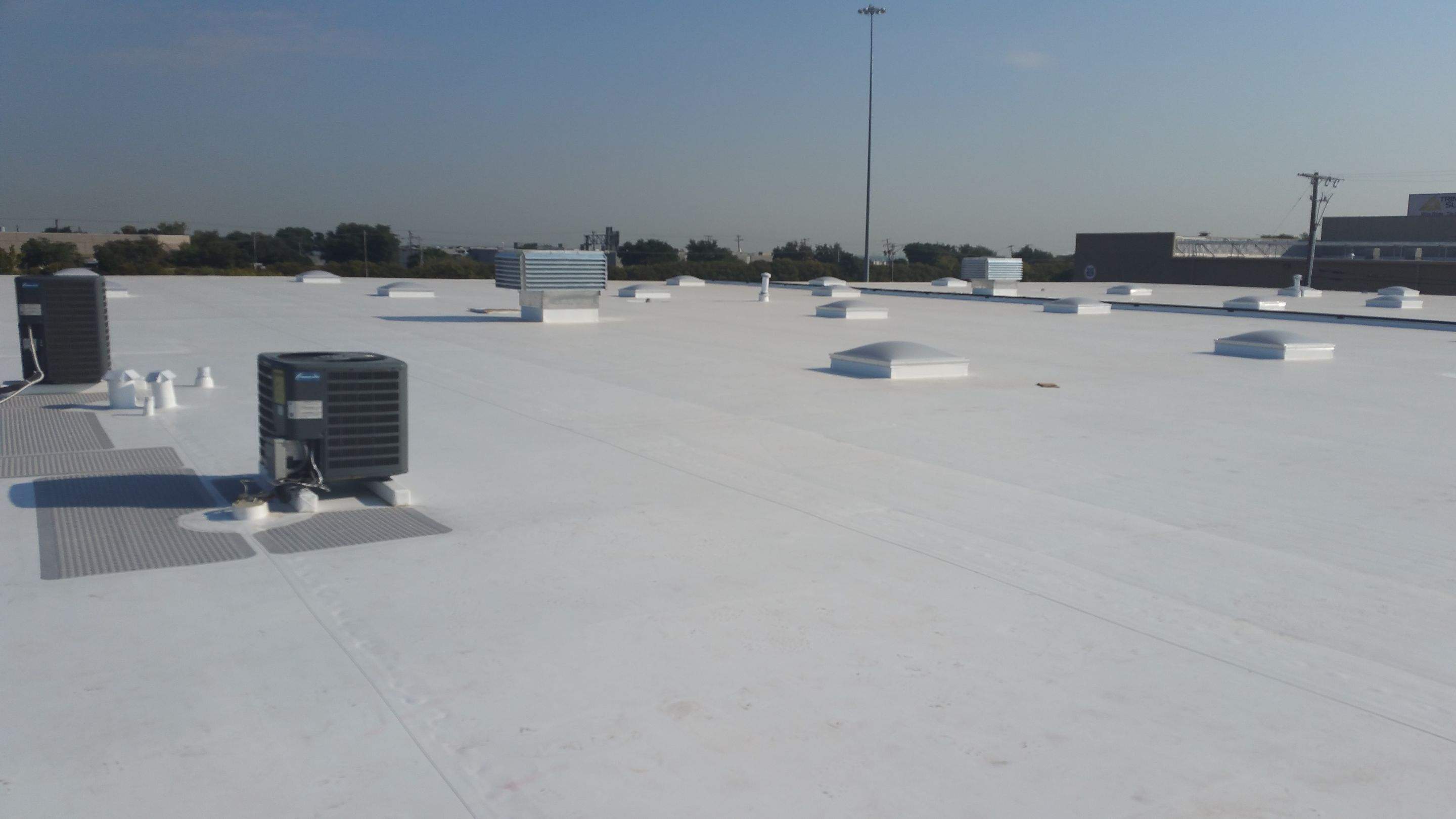 Massive Storm Damage Project - Factory in Arlington by First United Roofing & Construction