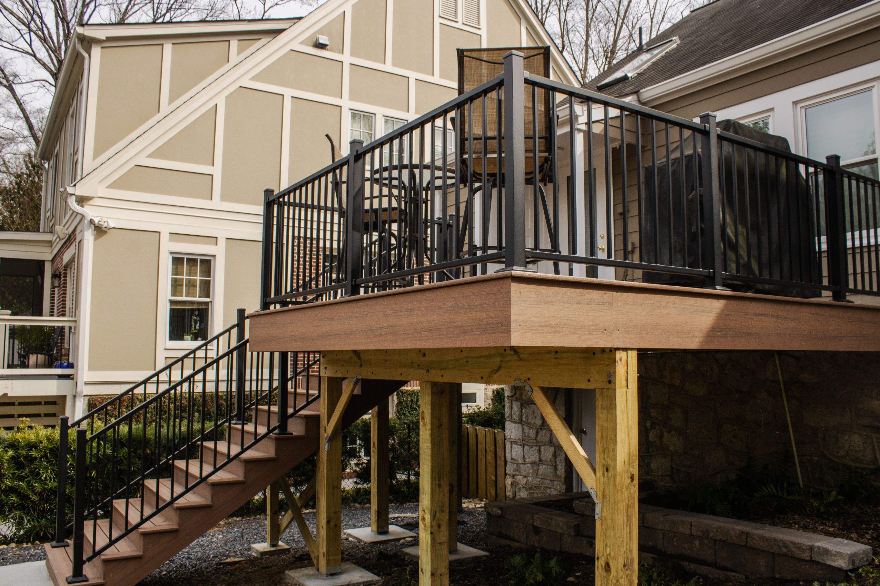 Full Siding Replacement, Deck Build, Exterior Paint, and Gutter Replacement by Nelson Exteriors
