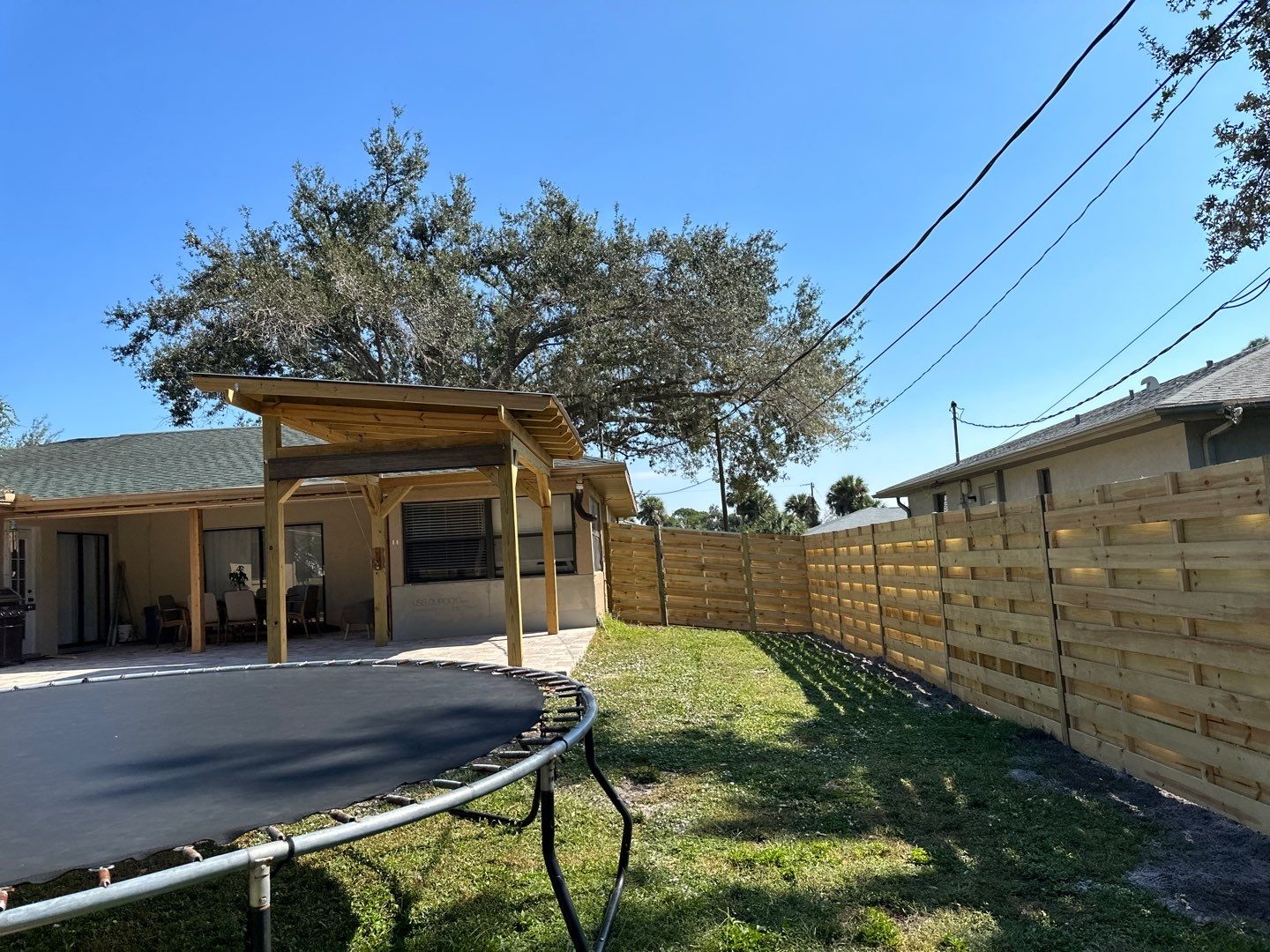 Wood Fence Installation using 6 Ft. Tall Pressure Treated Wood Shadowbox Fence by Asap fence and gates, LLC