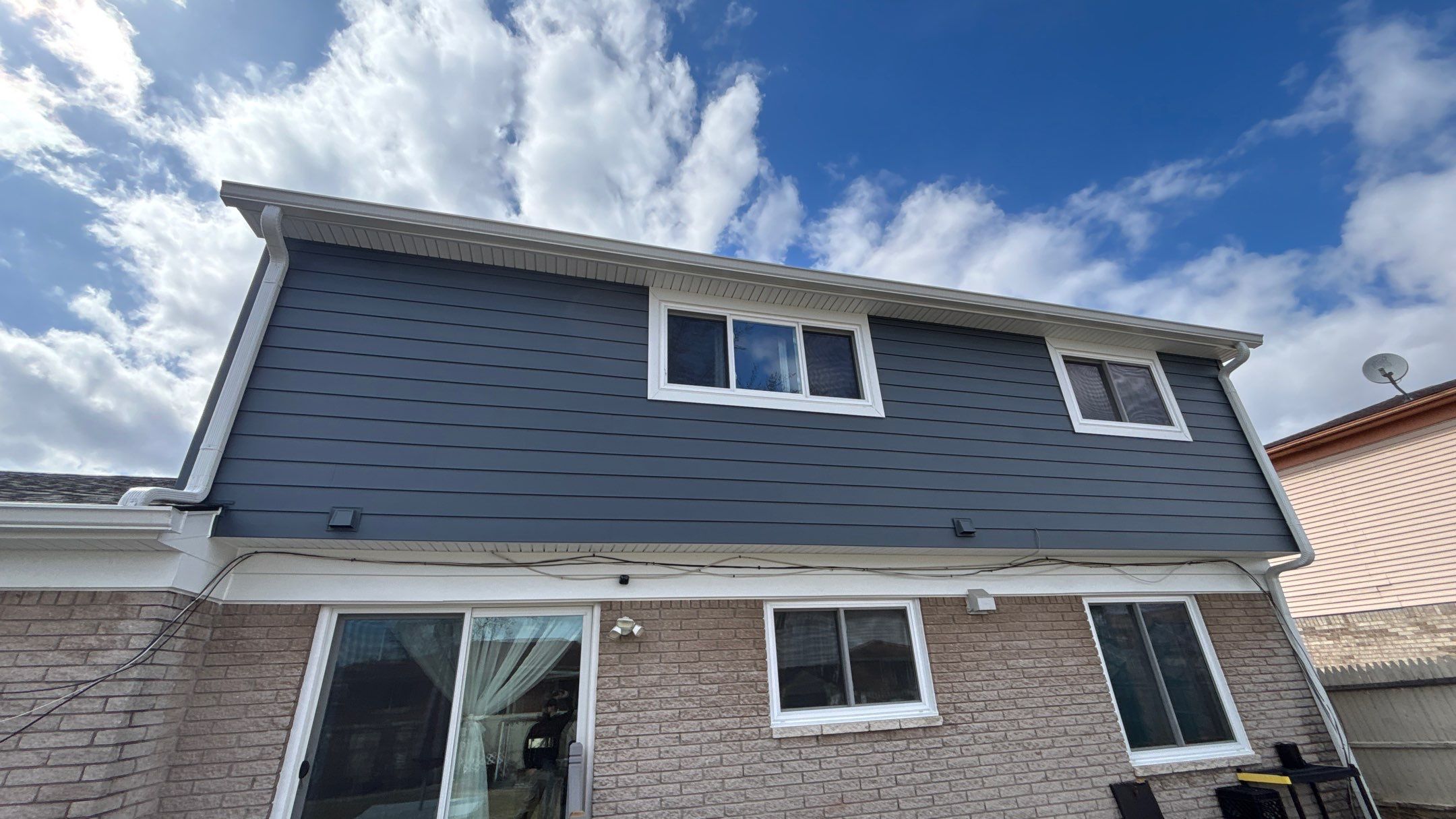 Siding Replacement using Alside Midnight Blue by 180 Contractors