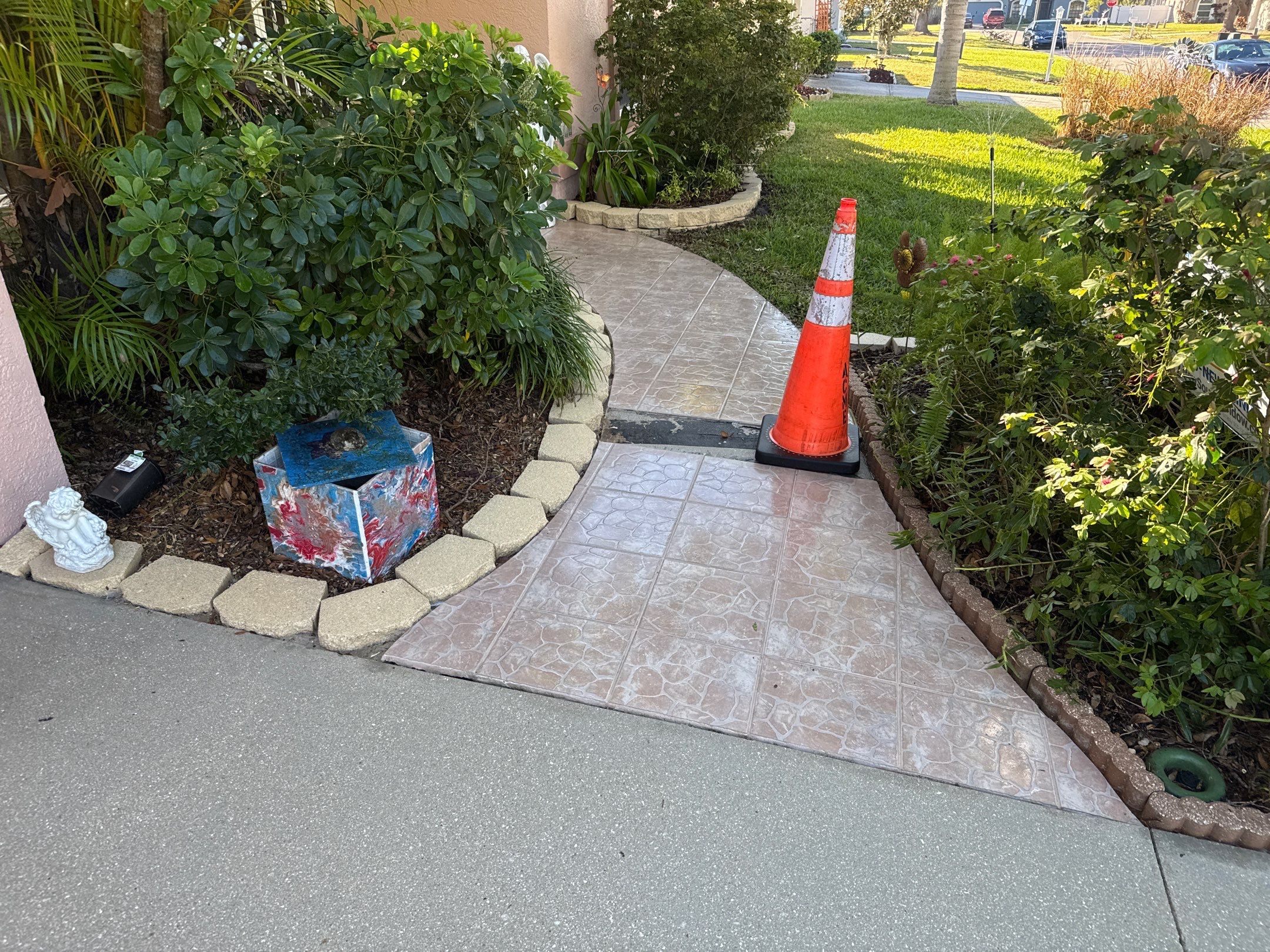 Concrete Driveway, Entryway, Flowerbed Curbing & Statue Cleaning in Heather Glen, Palmetto, FL | Sunshine AquaWash by Sunshine AquaWash