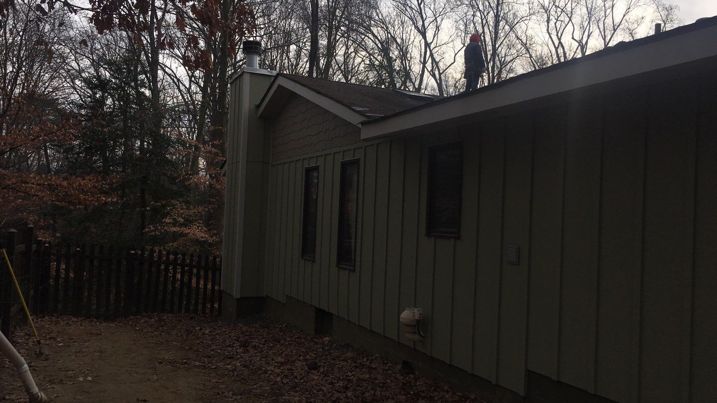 Siding Replacement by American Home Contractors
