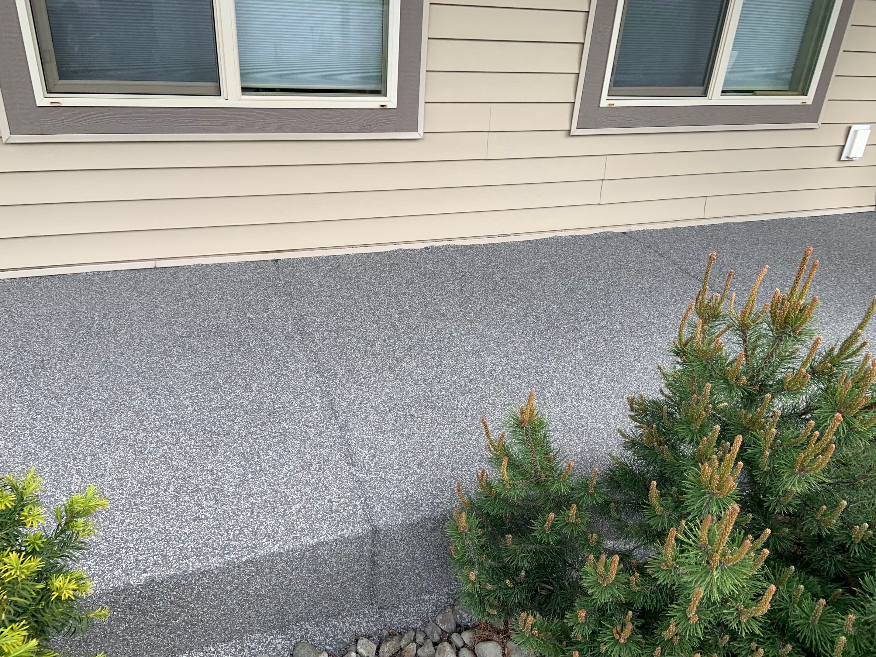 Garage Transformation using Pebble Beach and Front Porch using Greystone by Croc Coatings, LLC