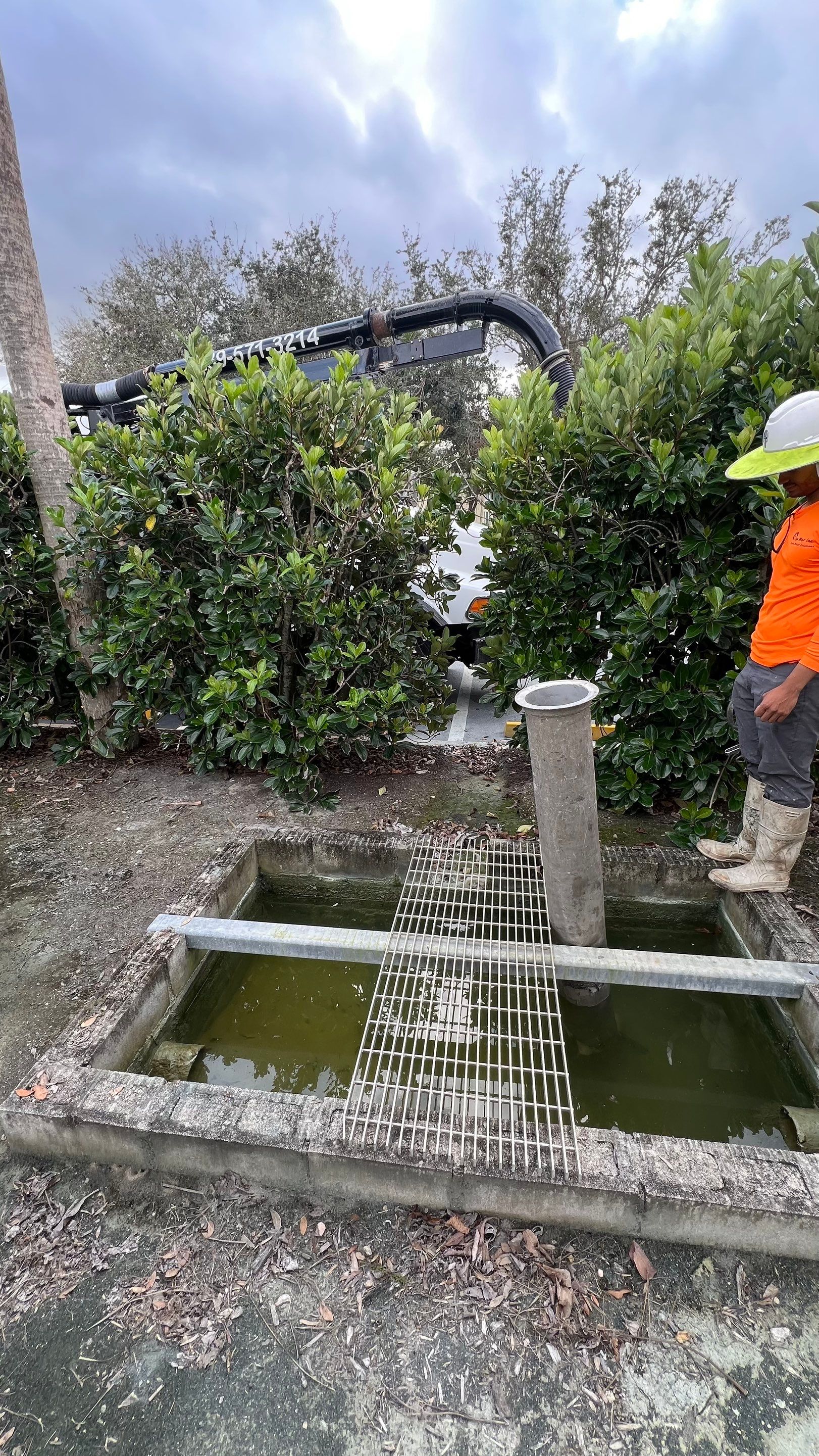Pelican Landing Tennis Court Catch Basin Cleaning by APS Power & Water