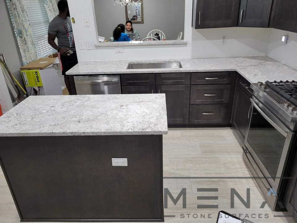 Kitchen countertops using Salinas White Granite  by Mena stone surfaces