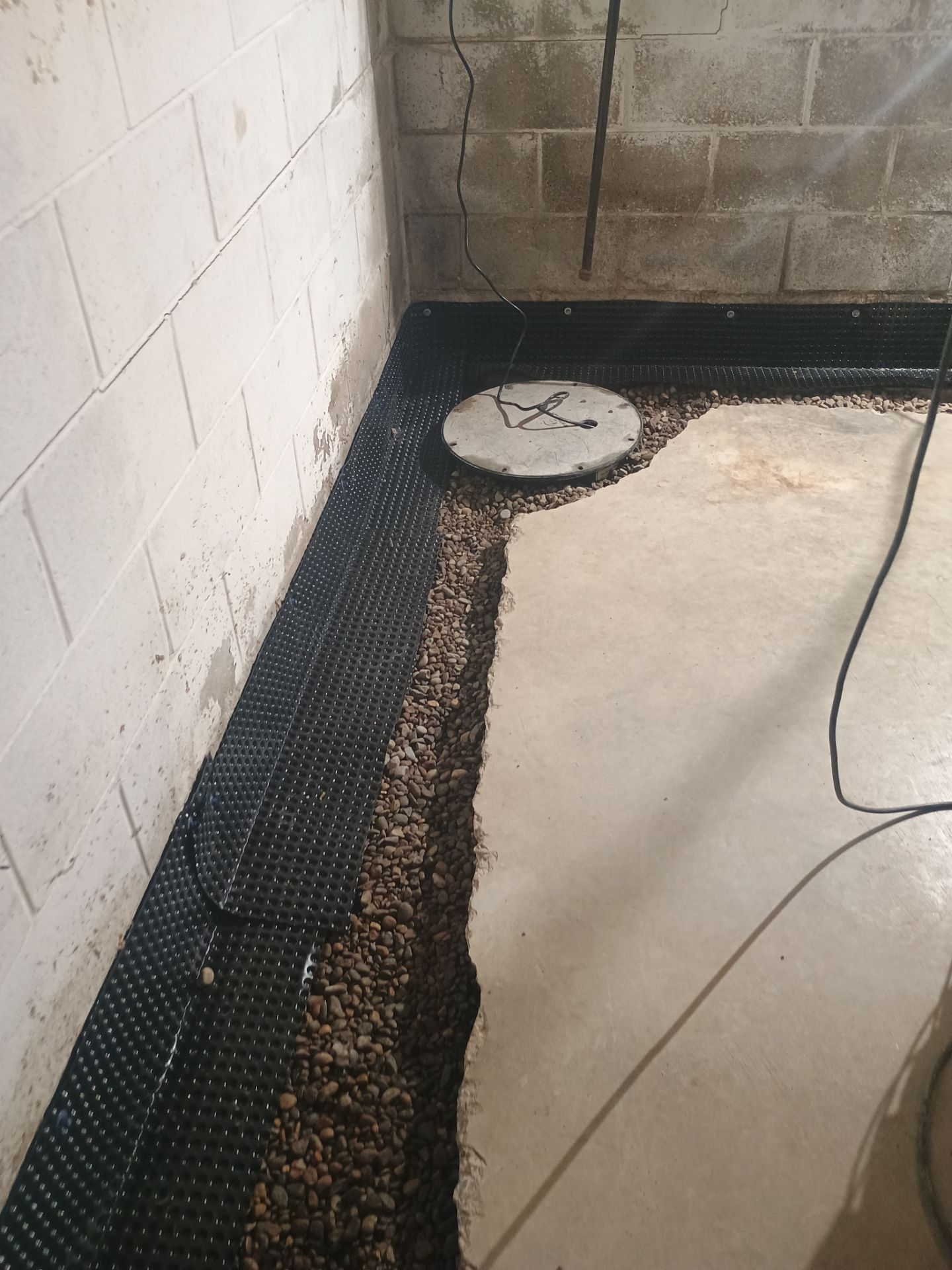 Interior Drain Tile Installation near Columbia Heights, MN by Waterproofing Northeast