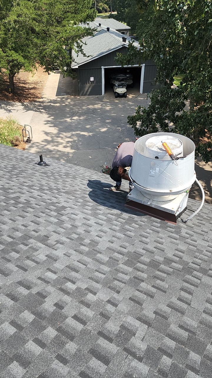 Country Club Roofing Installation by Reset Roofing
