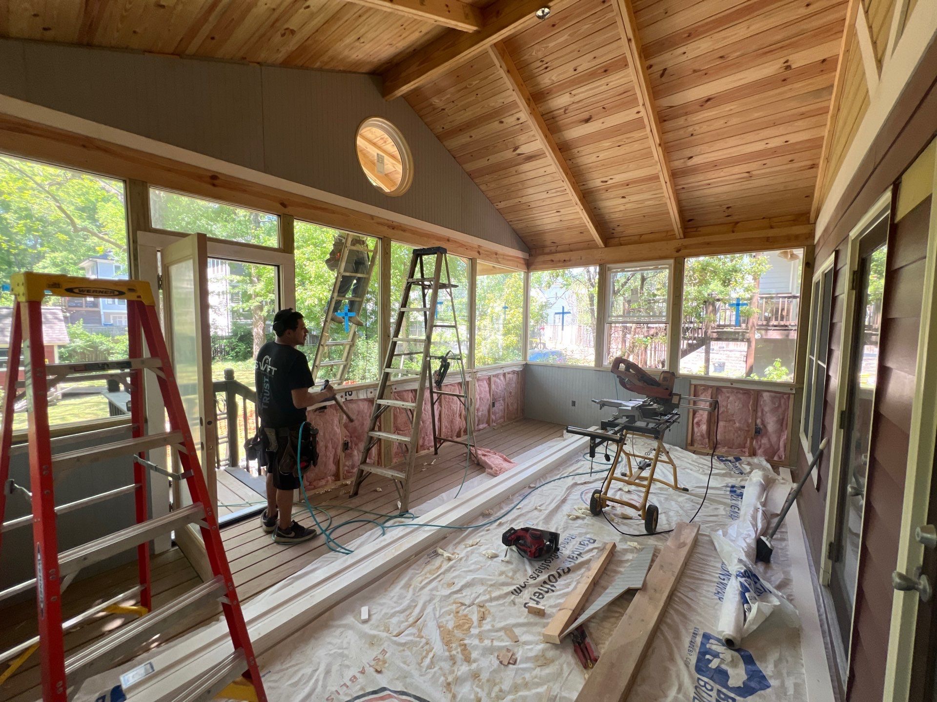 Elevated Screened-In Porch Addition with Vaulted Tongue-and-Groove Ceiling by Swift Home Renovations