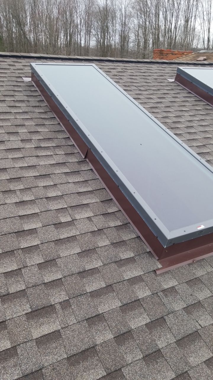 Skylight removal and install  by Absolute Roofing and Construction