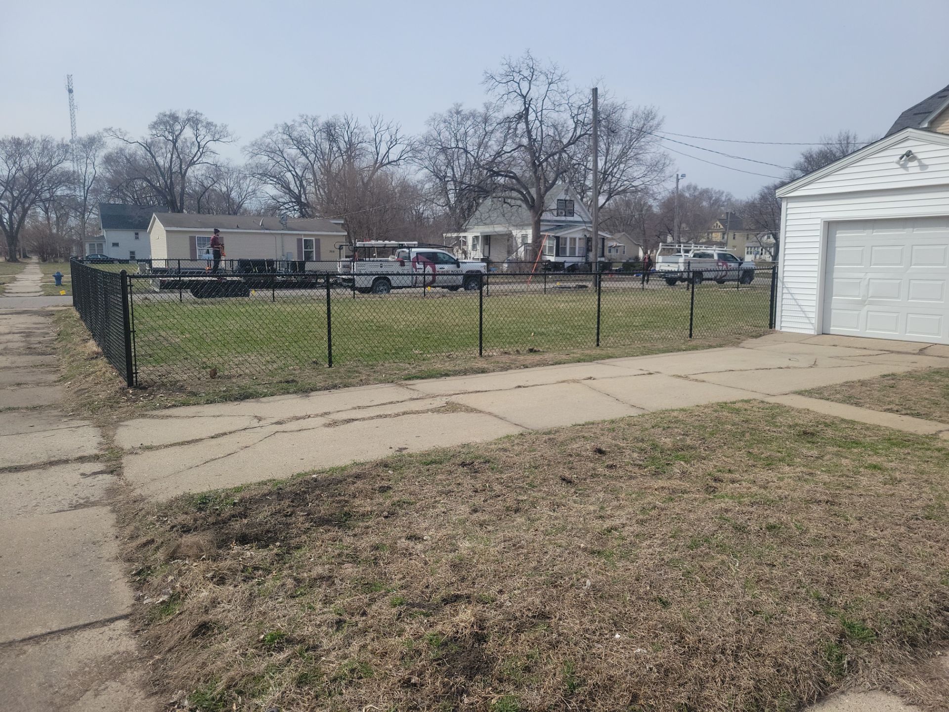 Black Chain Link Fence and Gate Installation in Waterloo by Perfect Picket Fence and Stain