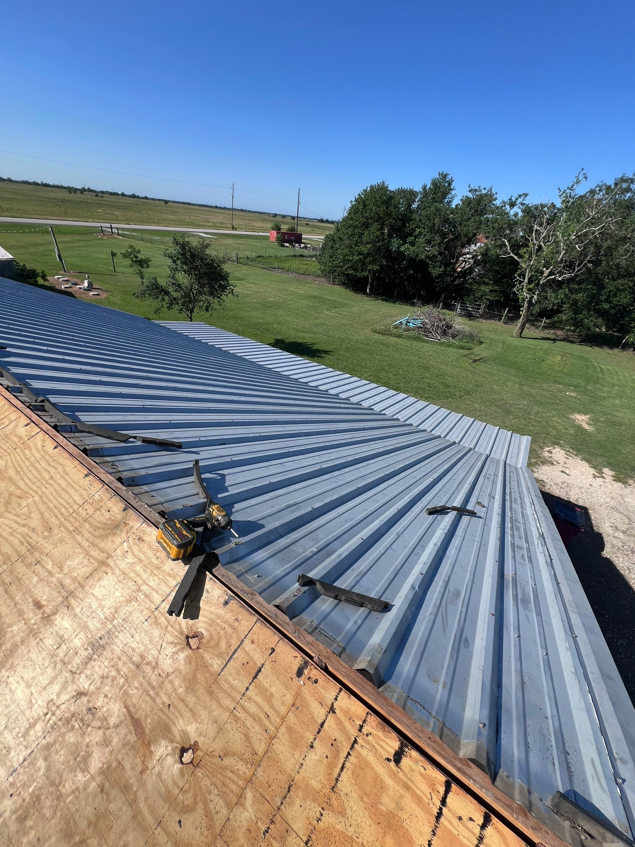 Residential Roofing Installation using Metal by Roof Repair Company