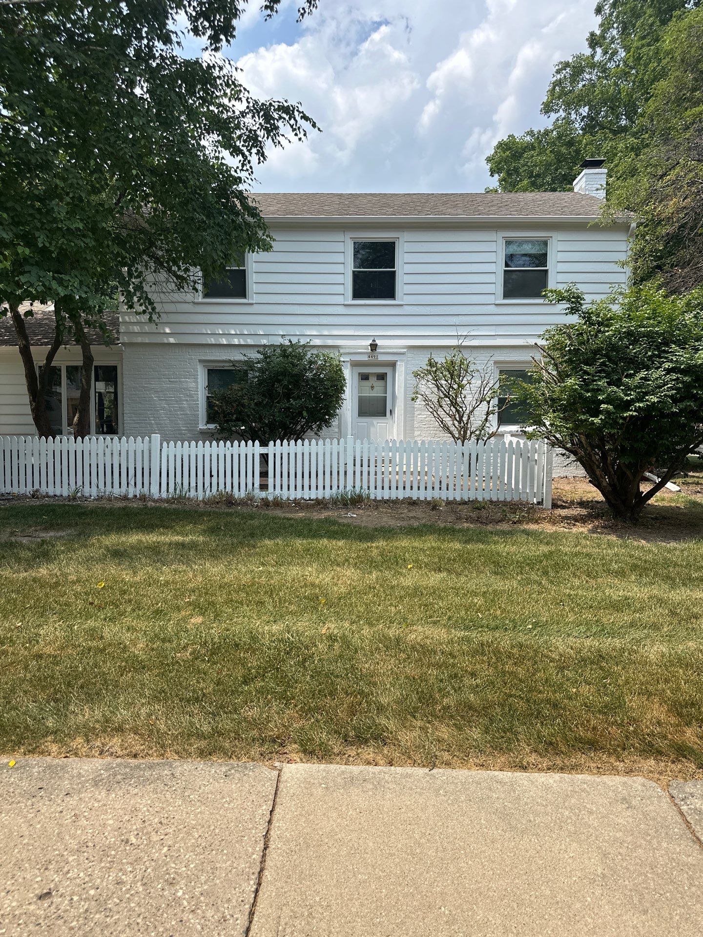 Shorewood Exterior Painting and Siding Refresh With Contrast Trim by OCS Contracting Services
