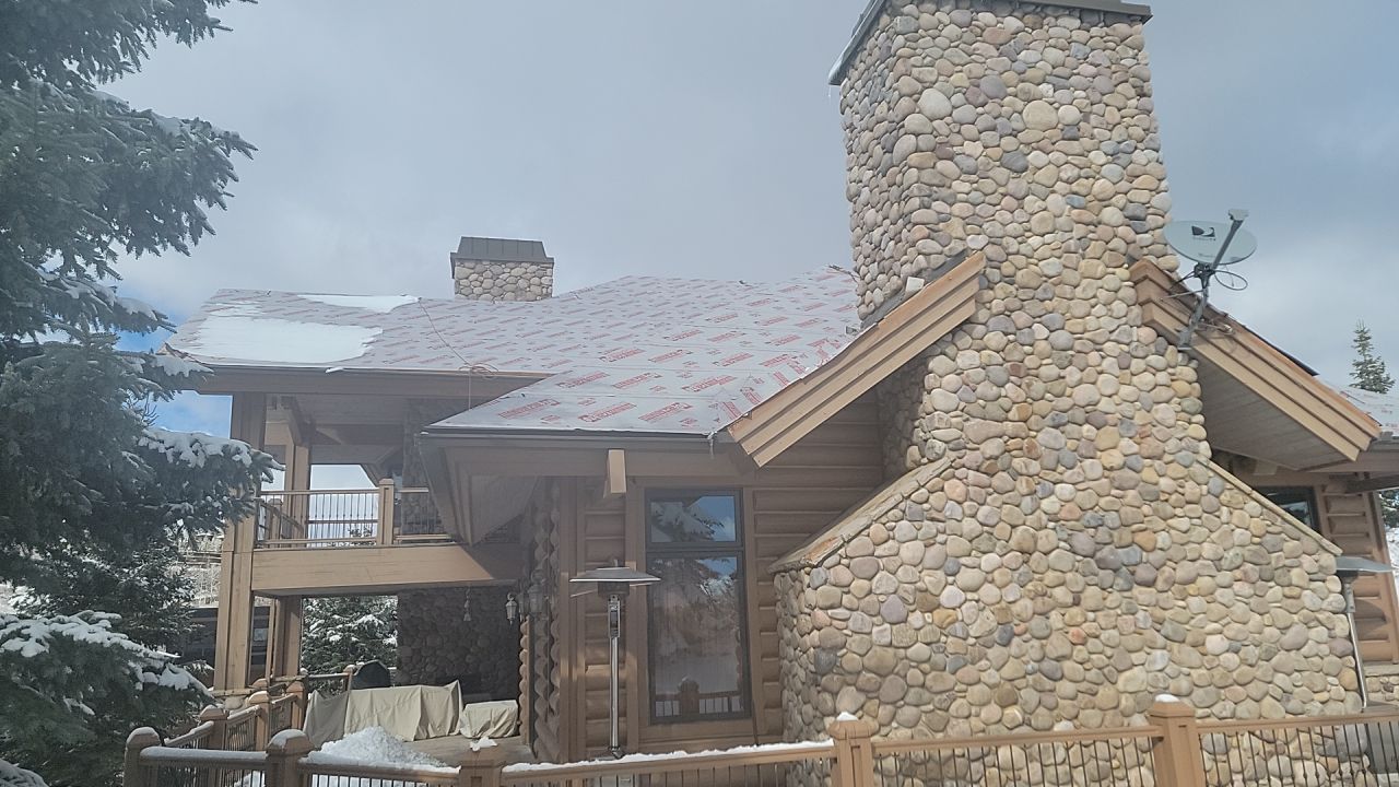 Standing Seam Metal Roof Replacement After Snow Damage by ASAP Roofing & Restoration
