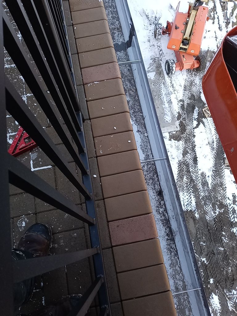 Paver install by Absolute Roofing and Construction