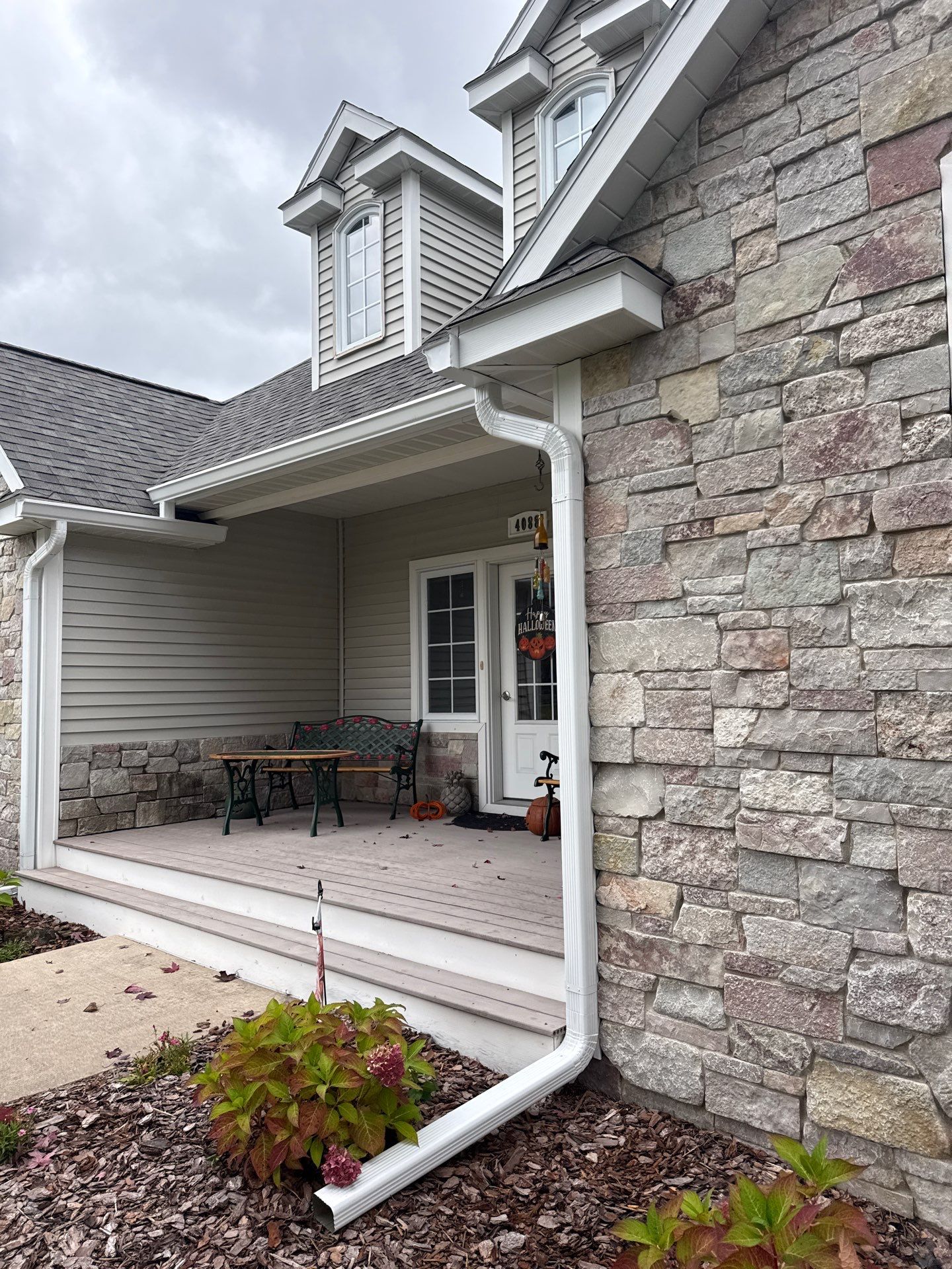 White Gutter System Installation for Traverse City Home