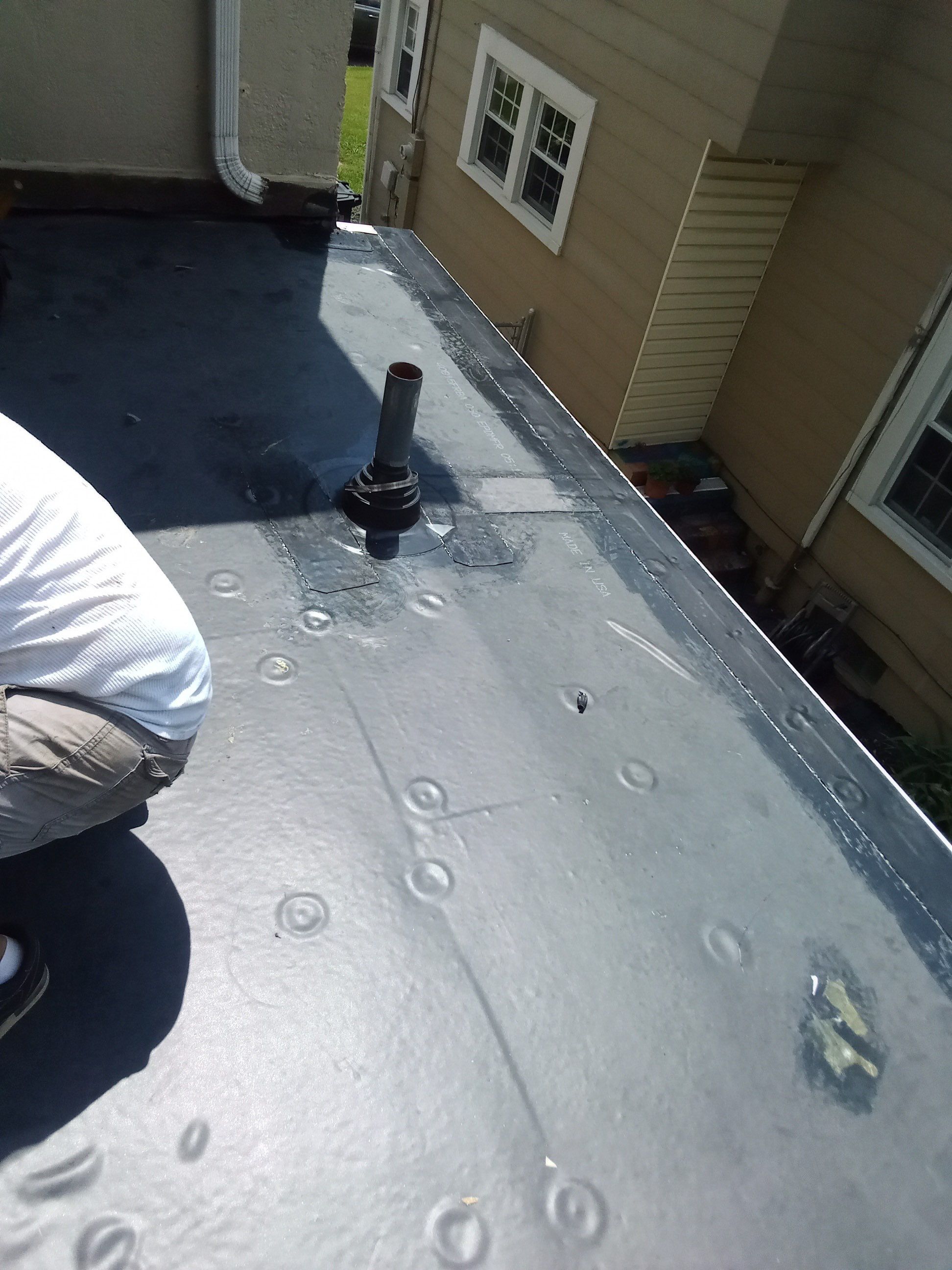 Rubber Roof and Gutter on Addition  by Secure Construction Company Inc