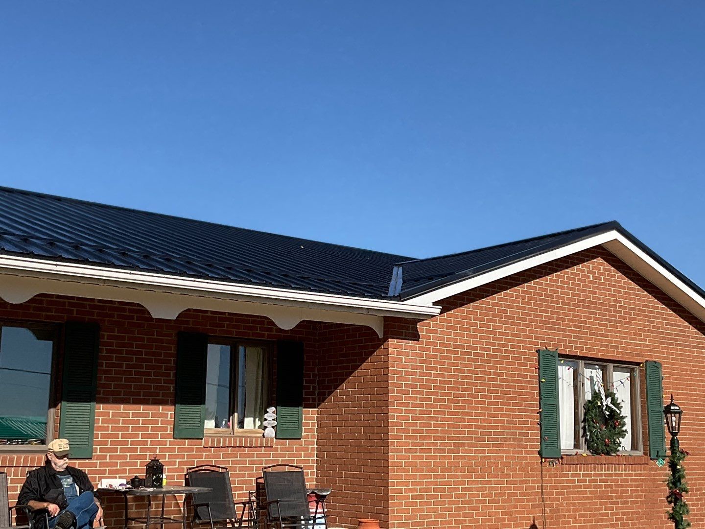 Residential Roofing Installation using Perfromance Panel Metal - Black by RoofX 