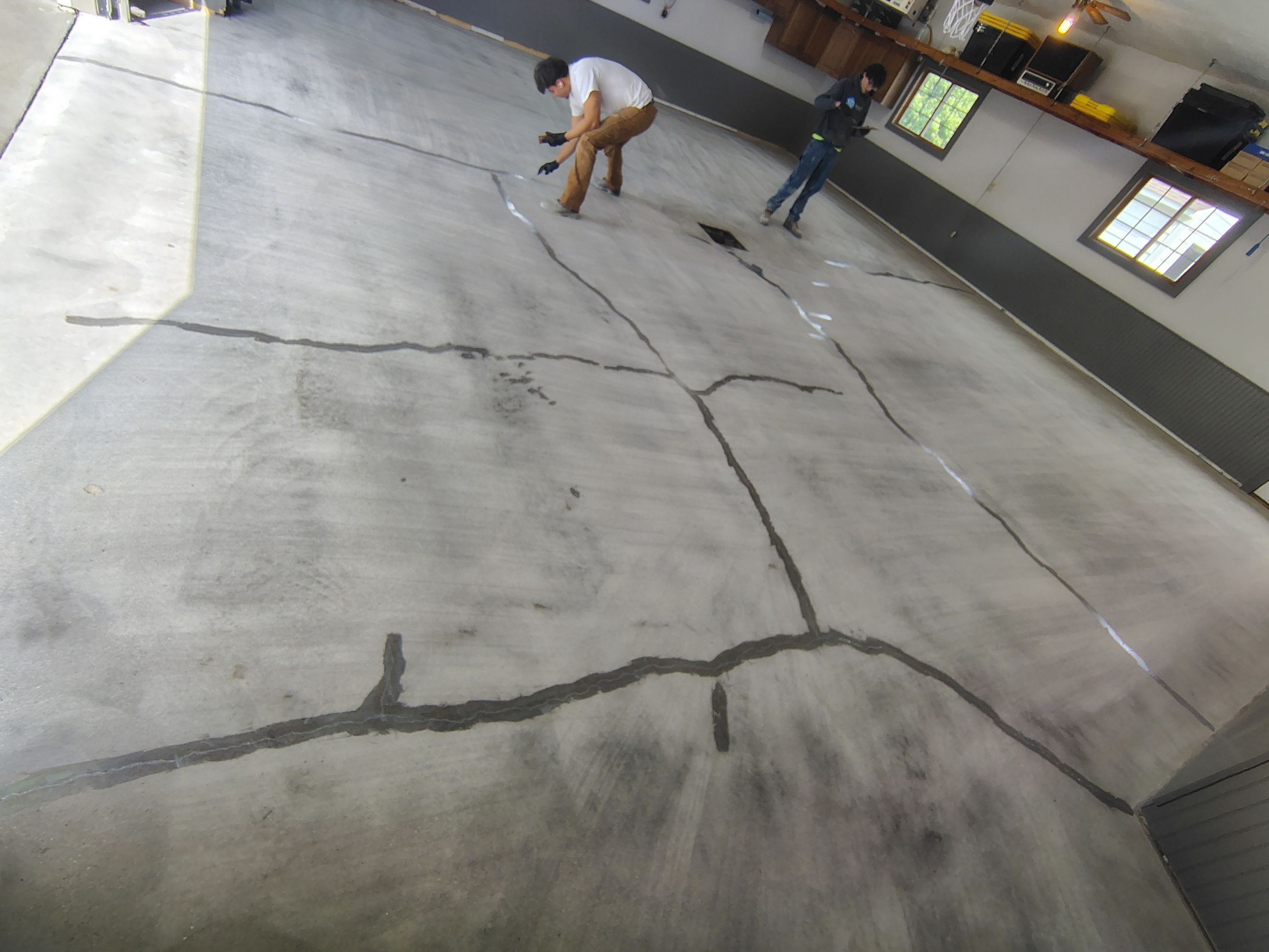 Multi-Fleck Epoxy Garage Floor Coating in Dell Rapids by Select Painting, Coatings & Garage Cabinets